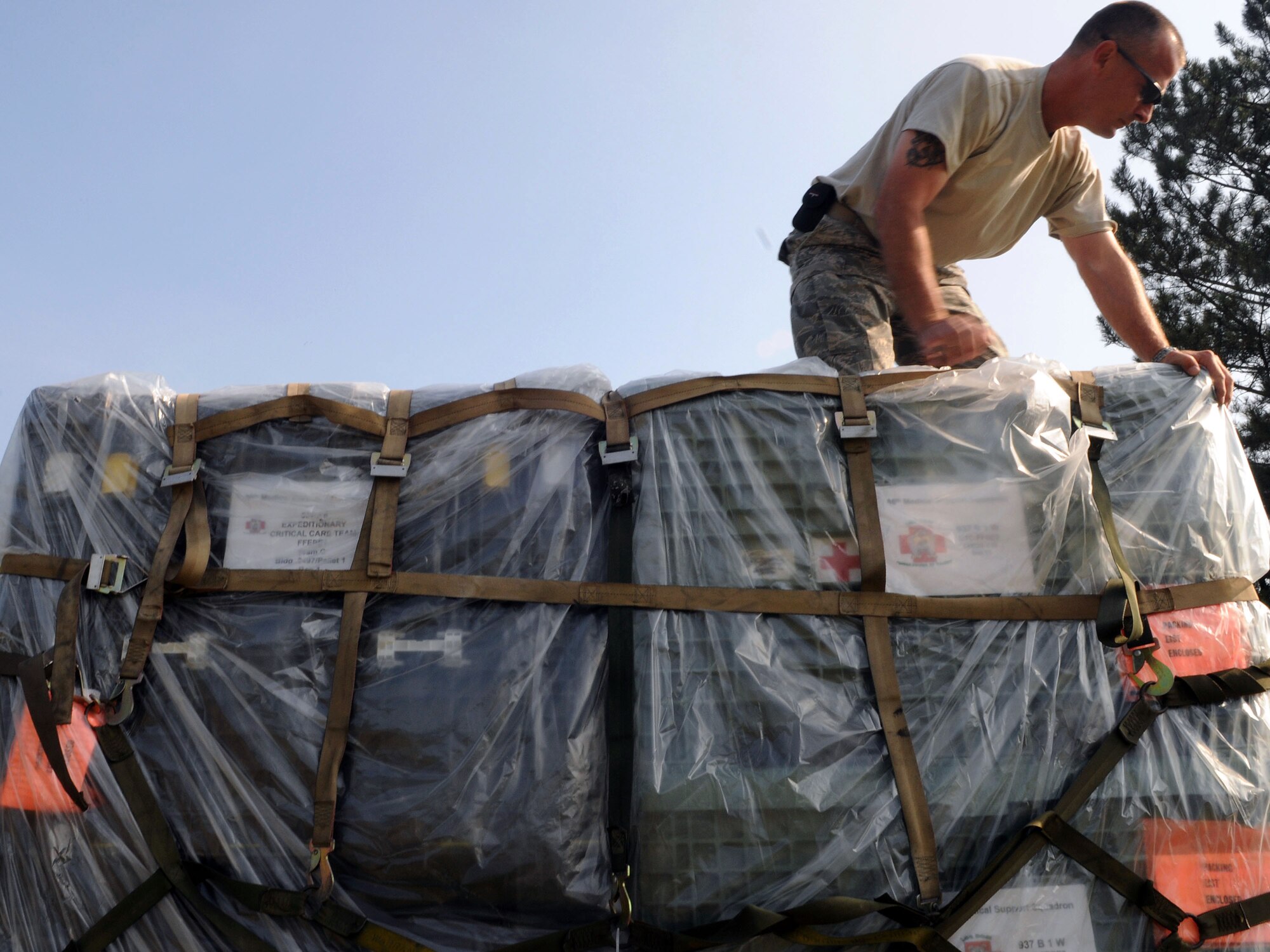 Master Sgt. Robert Janas helps unpack medical supplies for a mobile hospital Sept. 1, 2009, in Nis, Serbia. The exercise, hosted by Serbia, provides a joint medical learning environment and assists host nation civilian and military services; international, private and volunteer organizations; and other participating nations in enhancing disaster response actions. Sergeant Janas is assigned to the 458th Expeditionary Medical Squadron. (U.S. Air Force photo/Senior Airman Alex Martinez) 