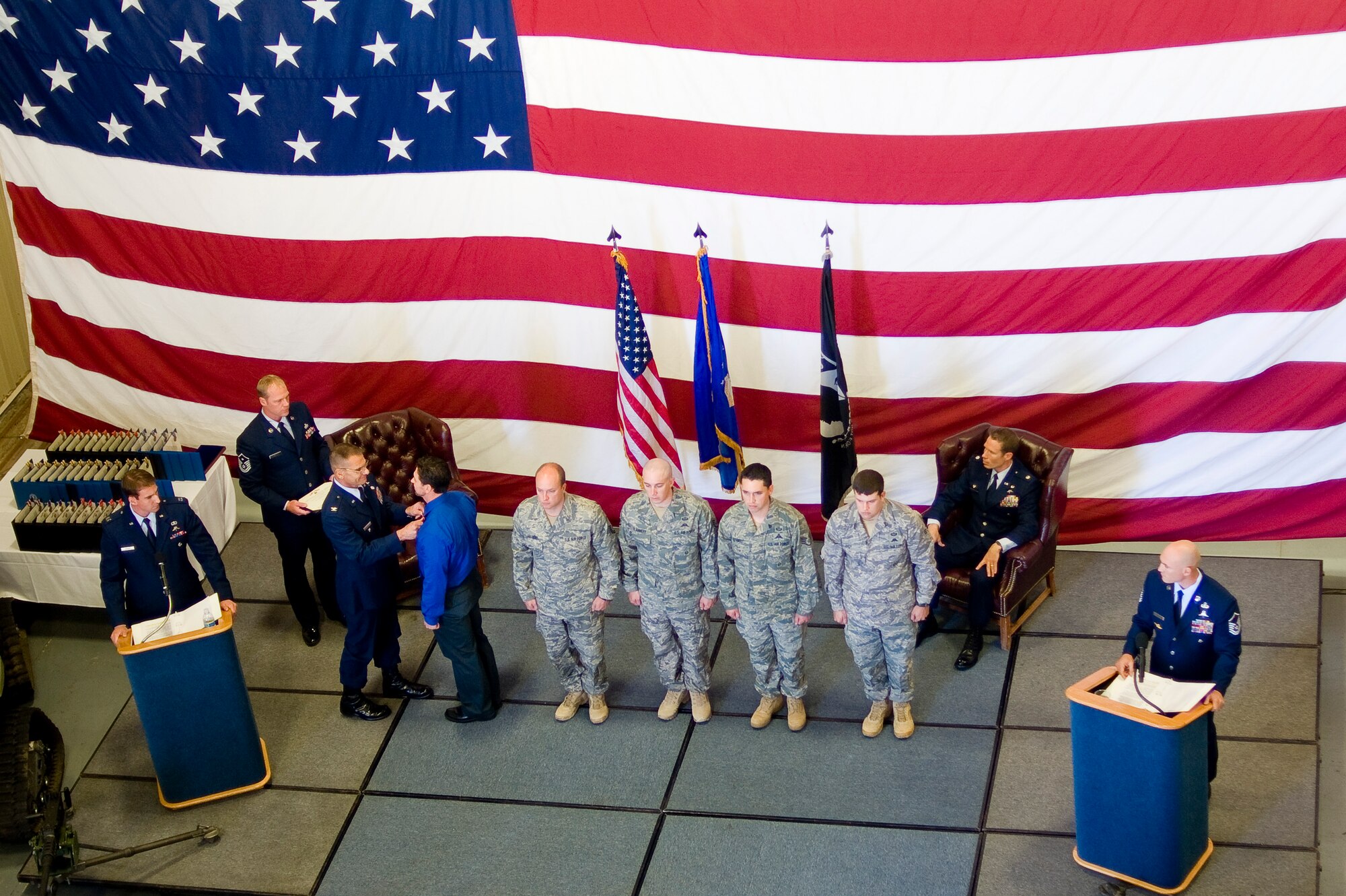 Colonel William Sherman, Chief of Operations Division, Air Force Special Operations Command, awards a Bronze Star to Master Sergeant Jason Dryer, 22 Special Tactics Squadron, during a ceremony here September 3.Twenty-nine members of the 22 STS were awarded thirty-seven medals, including five Bronze Star's and three Purple Heart's, as recognition for their performance while engaged in combat operations in Afghanistan and Iraq. (U.S. Air Force Photo by Abner Guzman)