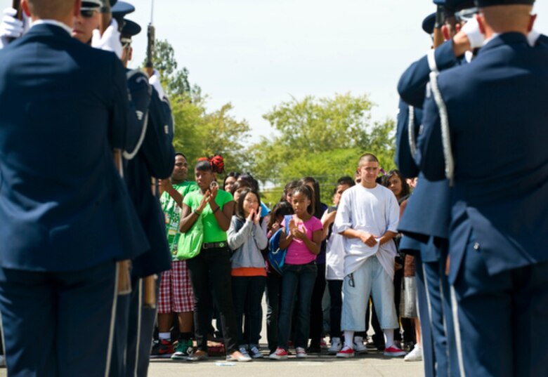 The United States Air Force Honor Guard Drill Team performs during a visit to Rosa Parks Middle School in Sacramento, Calif., Sept. 10, 2009,for Air Force Week-Sacramento. Air Force Week is an event using various activities and exhibitions to educate the community about the Air Force's capabilities and missions. (U.S. Air Force photo/Staff Sgt. Bennie J. Davis III)
