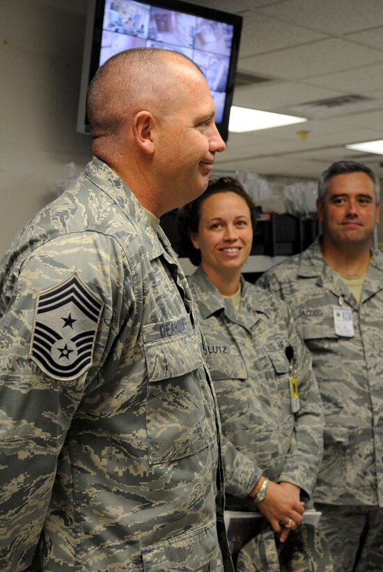 LANGLEY AIR FORCE BASE, Va. -- Chief Master Sgt. Scott Dearduff, command chief for the 9th Air Force and U.S. Air Forces Central Command, is given a tour of the Urgent Care Center by Tech. Sgt. Arthur Jacobs, 1st Medical Group flight chief of urgent care and Tech. Sgt. Beverly Lutz, 1st Medical Group non commissioned officer in charge of urgent care, here Sept.11. Chief Dearduff visited with Airmen and toured some of Langley's squadrons after attending the Air Combat Command change-of-command Sept. 10. (U.S. Air Force photo/Senior Airman Dana Hill)