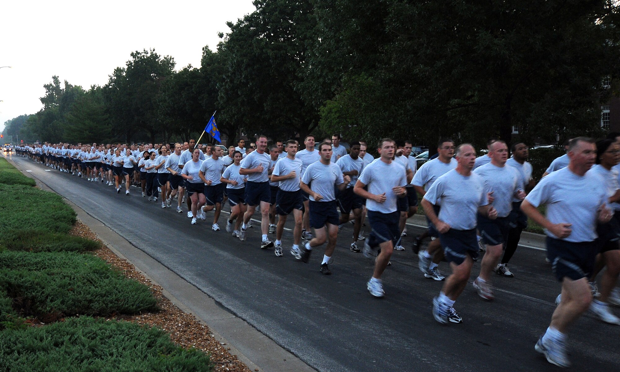 SCOTT AIR FORCE BASE, Ill. -- Airmen from the 375th Airlift Wing jog down Scott Drive during the two mile Sept. 11 Remembrance run. (Photo Courtesy Bob Fehringer) 