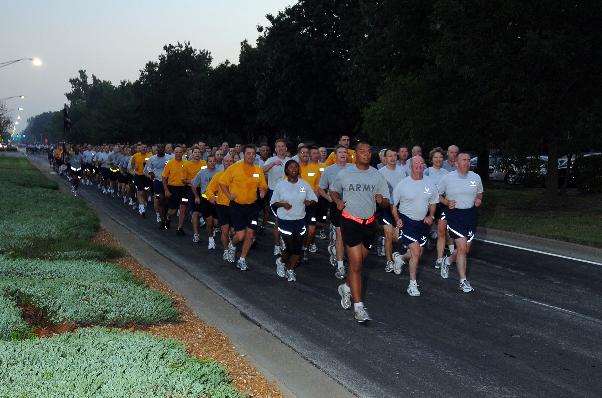 SCOTT AIR FORCE BASE, Ill. -- U.S. Transportation Command personnel run down the first leg of the two-mile Sept. 11 Remembrance Run held at Scott AFB. In addition to USTRANSCOM personnell members of the Air Force Network Integration Center, 375th Airlift Wing and Air Mobility Command participated in the run. (Photo Courtesy Bob Fehringer) 