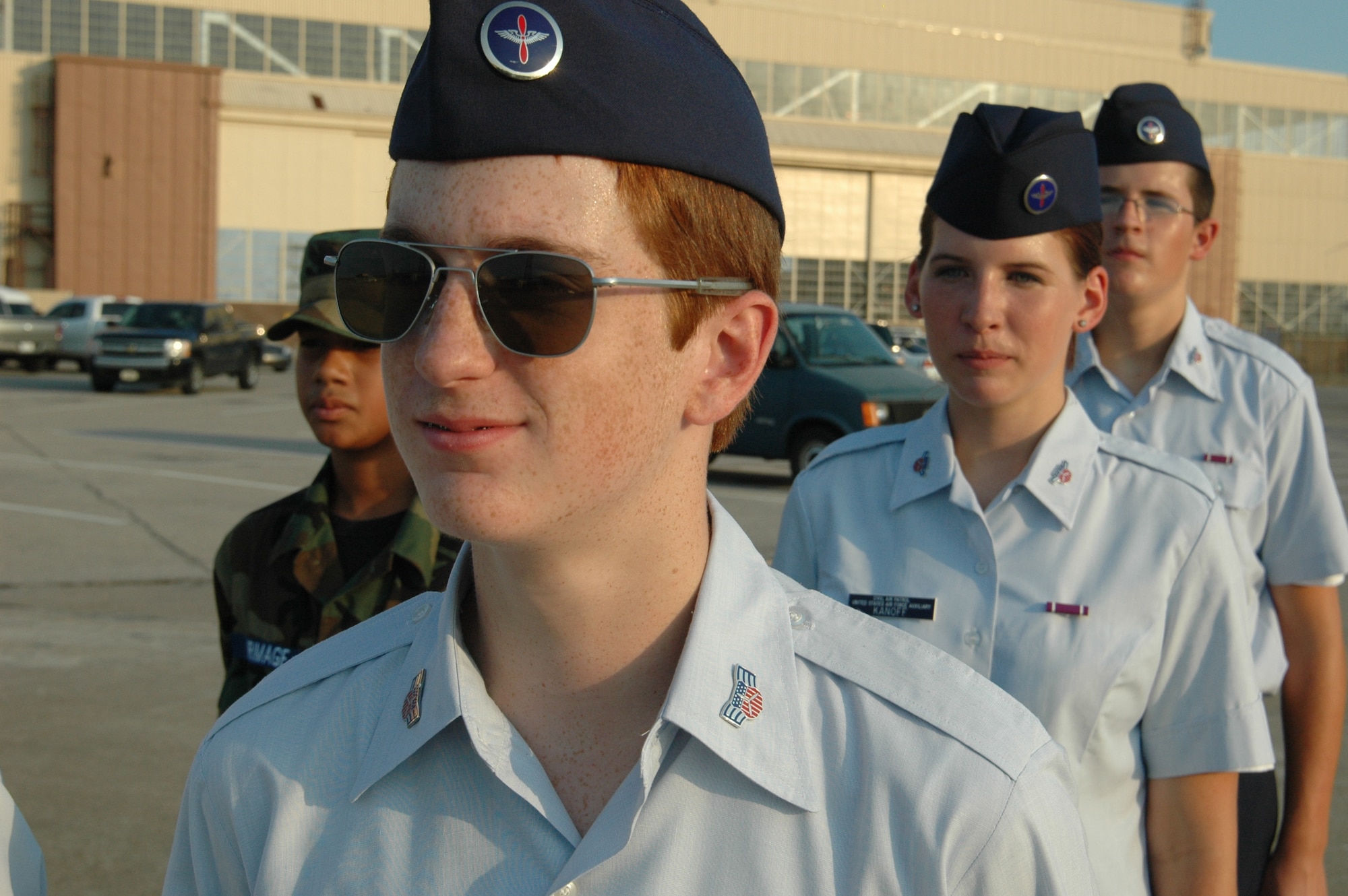 Cadet Airman Crothers and other CAP members practice formation during their weekly meeting at Tinker. CAP is the official auxiliary of the Air Force and as such has performed vital missions through the years, including spotting enemy subs and performing search and rescue operations.(Air Force photo by Howdy Stout)