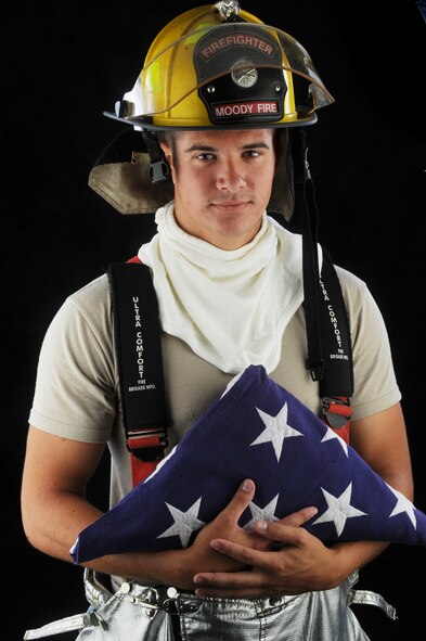 MOODY AIR FORCE BASE, Ga. -- Airman 1st Class Michael Barnette, 23rd Civil Engineer Squadron fire fighter, was in eighth grade and only 12 years old when the first attack happened at the World Trade Centers on Sept. 11, 2001. “I have family members in every other branch of service and I was the first one to join the Air Force. My wife is proud of my decision to become a firefighter but also understands that the job can be dangerous,” said Airman Barnette. (U.S. Air Force photo by Senior Airman Gina Chiaverotti-Paige)