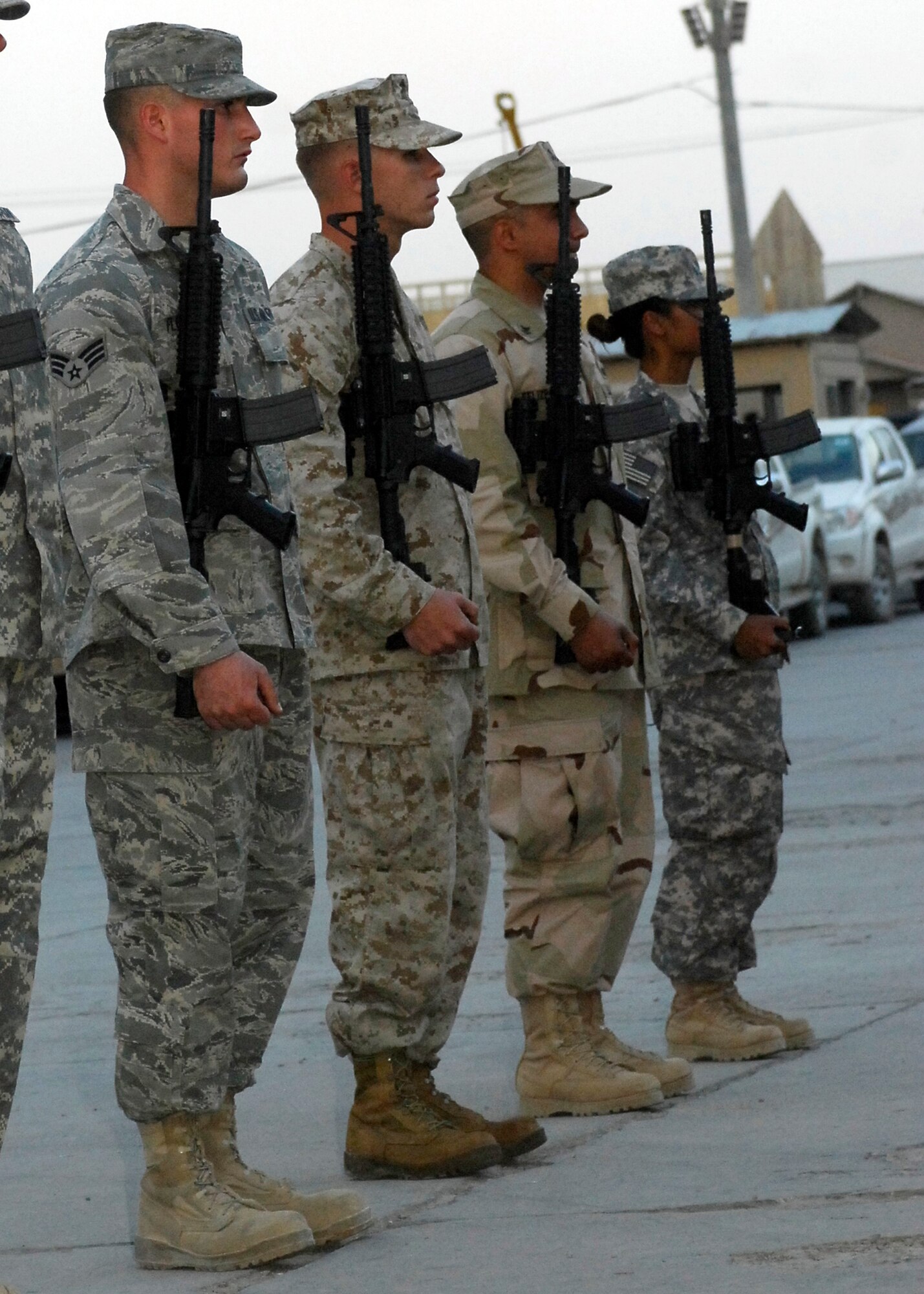 BAGRAM AIRFIELD, Afghanistan -- Senior Airman John Flowers, from Combined Joint Task Force-82, was the only Air Force member of a Joint Service 21-Gun Salute Team, which fired a volley in honor of the 9-11 memorial service here, Sept. 11, 2009.  The memorial was held at 5:17 p.m. Kabul time which is the exact time the first plane hit the World Trade Center's Twin Towers eight years ago.  The ceremony was held to honor the memory of those who lost their lives in the attacks of September 11, 2001.  "Doing what I can for my country is important to me," said Airman Flowers, when asked how he felt about being deployed to Afghanistan as well as playing such an important role in the ceremony.  Airman Flowers is deployed from Nellis Air Force Base, Nev., and hails from Ashtabula, Ohio.  (U.S. Air Force photo/Senior Airman Felicia Juenke)
