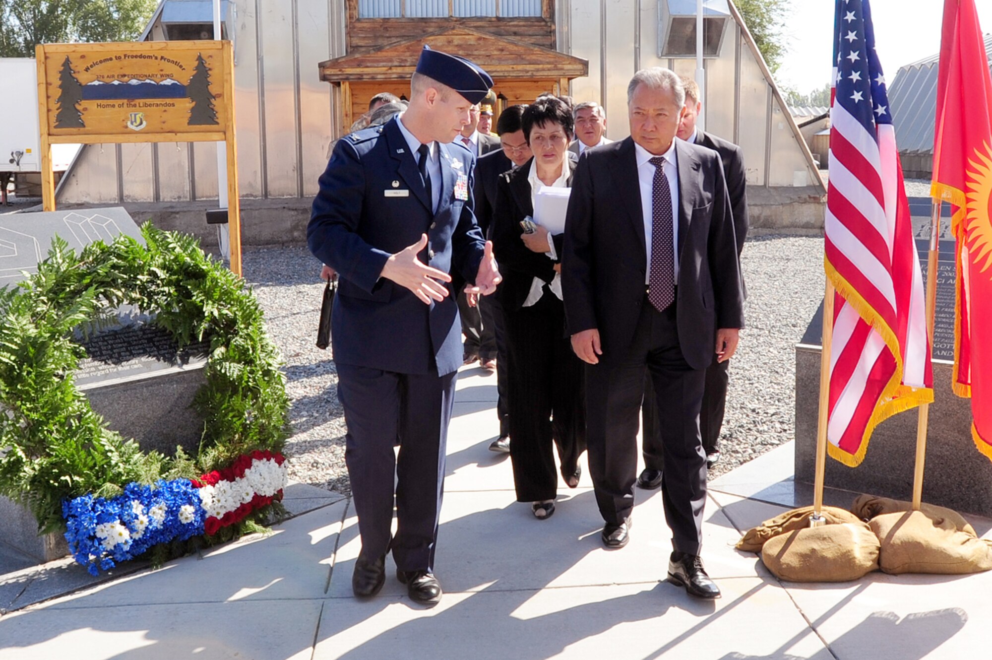 Kyrgyz President Kurmanbek Bakiyev and Col. Blaine Holt tour the base during a visit by the president Sept. 11, 2009, at the Transit Center at Manas, Kyrgyzstan. President Bakiyev honored those who lost their lives in 2001 with a wreath-laying ceremony and a few words of friendship between Kyrgyzstan and the U.S. Colonel Holt is the 376th Air Expeditionary Wing commander. (U.S. Air Force photo/Senior Airman Steele C. G. Britton) 
