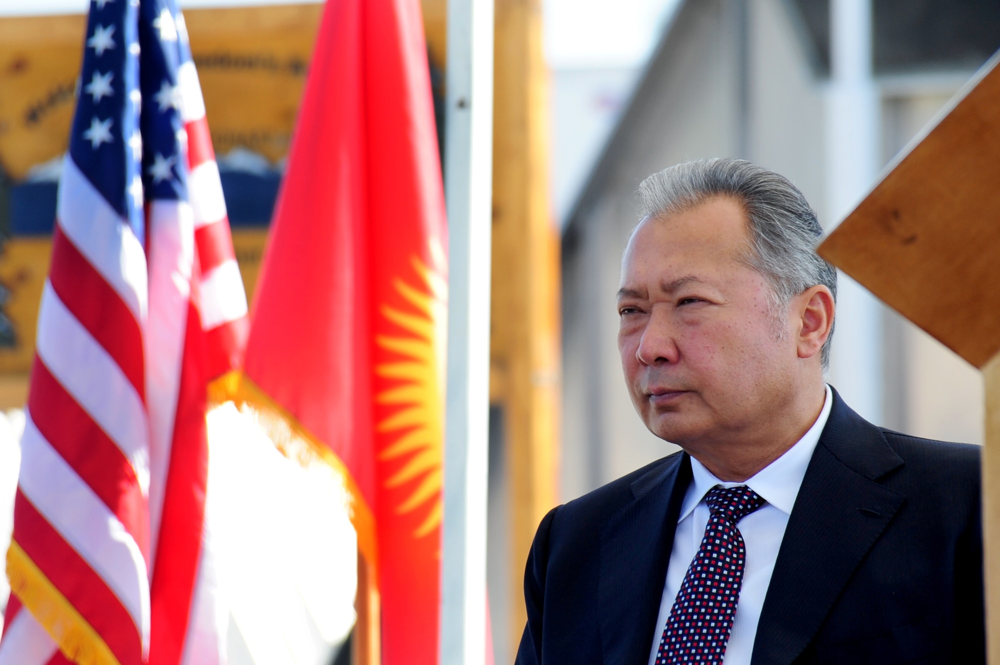 Kyrgyz President Kurmanbek Bakiyev prepares to speak at a wreath-laying ceremony to honor those who lost their lives in 2001 Sept. 11, 2009, at the Transit Center at Manas, Kyrgyzstan. (U.S. Air Force photo/Senior Airman Steele C. G. Britton) 
