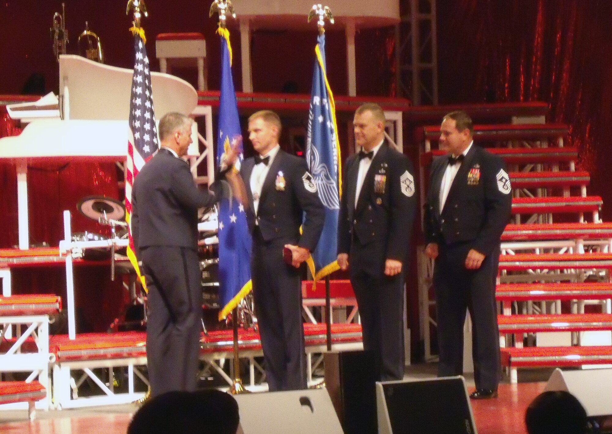 Left to right, Maj. Gen. Anthony Przybyslawski, Air Education and Training Command vice commander, Master Sgt. Rye Bavin, United States Air Force  Career Assistance Advisor of the Year, Chief Master Sgt. James Roy, current chief master sergeant of the Air Force, and  the president, Air Force Sergeants Association at the 2009 Professional Airman’s Conference, Atlanta, Ga, Aug. 19. (U.S. Air  Force photo by Staff Sgt. Shaila Lane)
