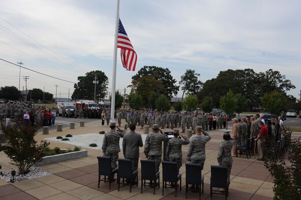 SHAW AIR FORCE BASE, S.C. -- Airmen salute on Sept. 11, 2009, during the playing of Taps as they mark the anniversary of the 9/11 terrorist attacks eight years ago. Airmen and civilians gathered to pay tribute to the lives lost in those attacks and since then in the global war on terror. (U.S. Air Force photo/Senior Airman Matt Davis)