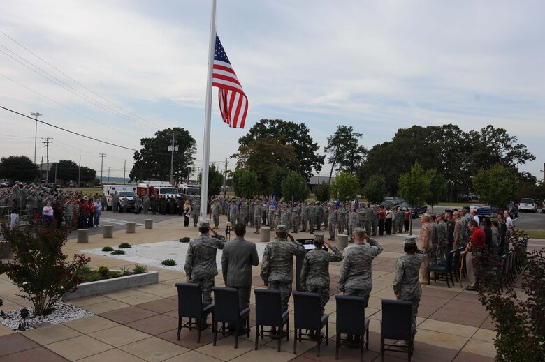 SHAW AIR FORCE BASE, S.C. -- Airmen salute on Sept. 11, 2009, during the playing of Taps as they mark the anniversary of the 9/11 terrorist attacks eight years ago. Airmen and civilians gathered to pay tribute to the lives lost in those attacks and since then in the global war on terror. (U.S. Air Force photo/Senior Airman Matt Davis)