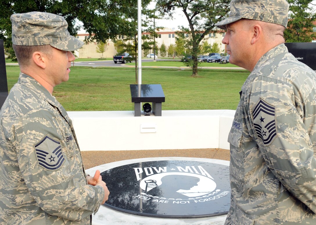 LANGLEY AIR FORCE BASE, Va. --  Chief Master Sgt. Scott Dearduff, command
chief for the 9th Air Force and U.S. Air Forces Central Command,is given a
tour by Master Sgt. Robert Casagrande, Air Combat Command airborne systems
chief, of the POW/MIA memorial here Sept.11. Chief Dearduff took the tour to
better understand how Langley operates and to see how Airmen carry out the
everyday mission.(U.S. Air Force photo/Airman1st Class Jonathan Koob)
