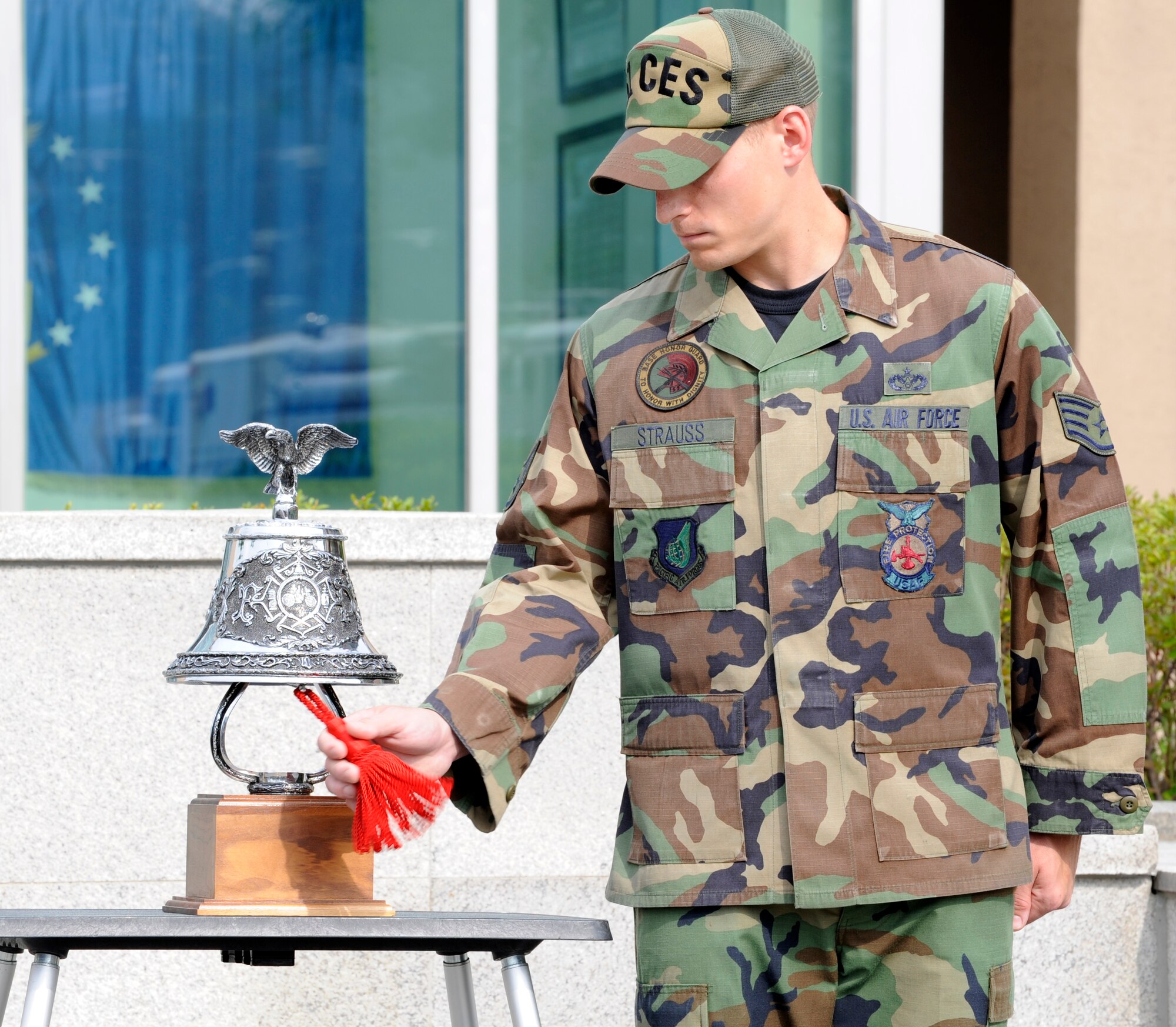 Staff Sgt. William Strauss rings a bell in remembrance of those who died, and whose lives were forever changed because of the Sept. 11, 2001 attacks. At 9:11 a.m., Sept. 11, members of Team Osan gathered in remember of the events and also pay tribute to the men and women of the U.S. Armed Forces who serve. (U.S. Air Force photo/Senior Airman Stephenie Wade)


