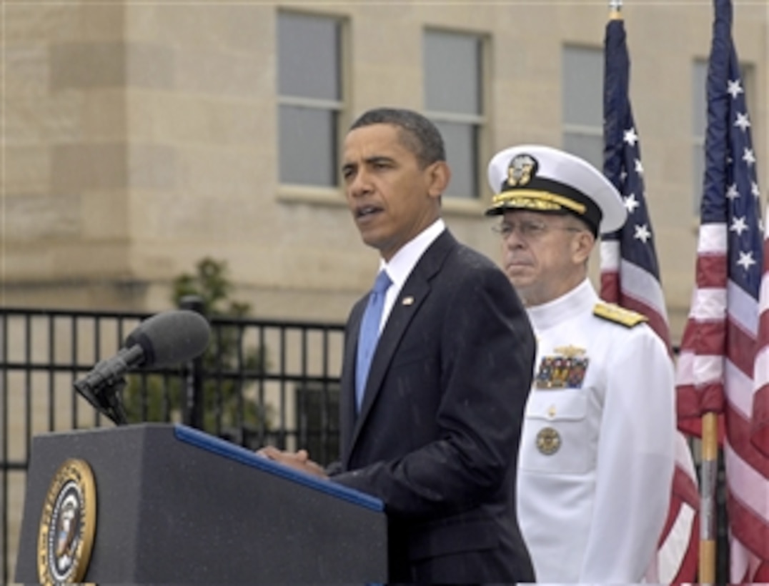 President Barack Obama addresses the audience assembled at the Pentagon Memorial to mark the 8th anniversary of the terrorist attack on the building on Sept. 11, 2009.  One hundred twenty-five Pentagon employees were killed along with all 59 passengers and crew aboard American Airlines Flt. 77 when the hijacked plane was deliberately crashed into the west side of the building.  