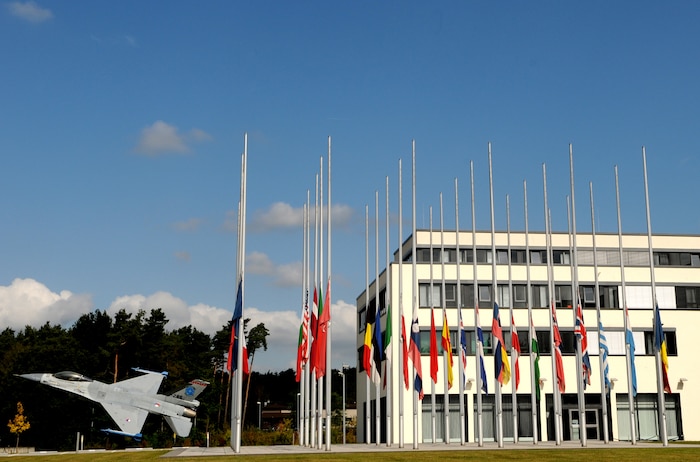 The US flag flew at half staff today at the Allied Air Component Headquarters Ramstein Air Base Germany in remembrance of September 11th 2009.  The flag along with the flags of the 27 other nations of the NATO Alliance were flown in observance of the eight year anniversary of the terrorist attacks on New York City, the Pentagon and Somerset County, PA.  Although the attacks occurred on American soil, the impact was felt by the Alliance as a whole and the 28-nation's solidarity was demonstrated by NATO's first ever enactment of Article 5.  Article 5 states that if a NATO Ally is attacked, the Alliance considers the attack as one against all members, and will take necessary actions to assist the Ally attacked. (U.S. Air Force photo by Tech. Sgt. Sean Mateo White)
