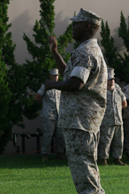 Chief Warrant Officer 2 Edward Hayes, the director of the 3rd Marine Aircraft Wing Band, directs the band at Marine Corps Air Station Miramar's colors ceremony Sept. 11. The band played several songs during the ceremony.