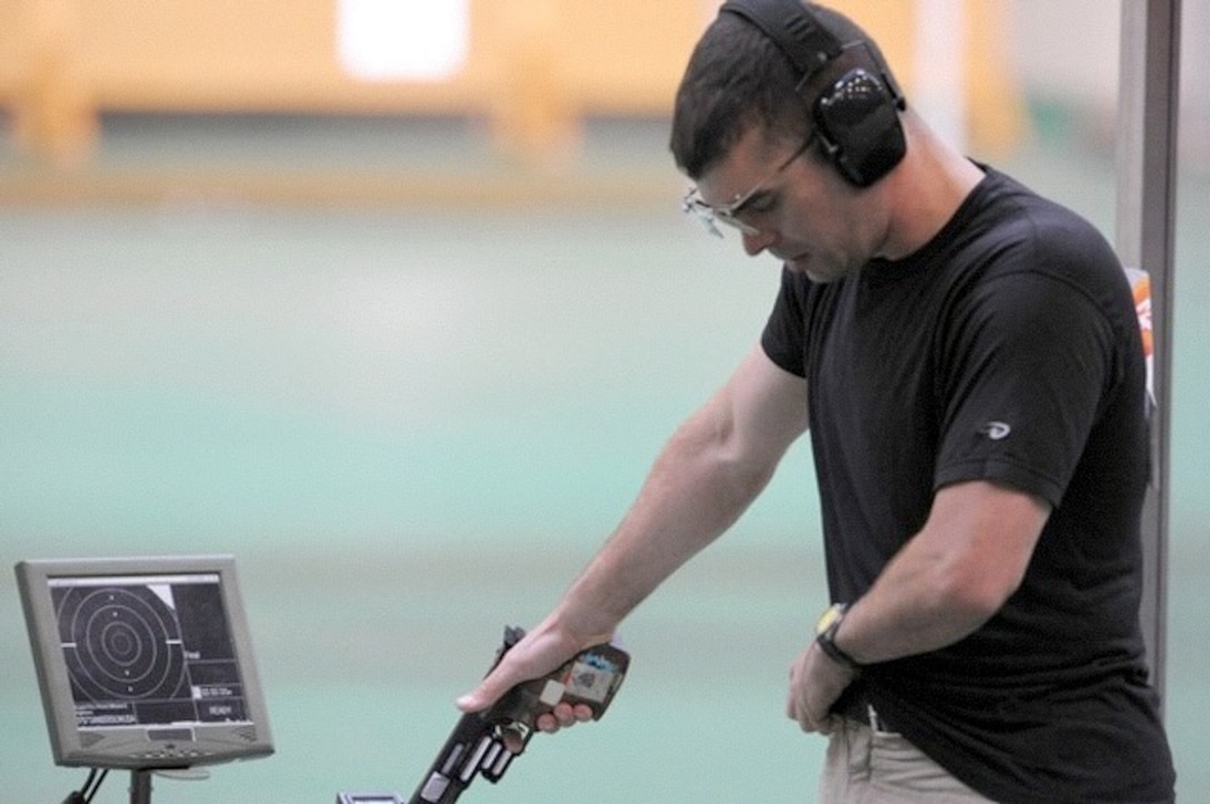 Keith Sanderson, chief marksmanship instructor, Marine Corps Base Hawaii, is a world-class shooter in the rapid fire pistol event. He is currently training for the World Cup Finals, the World Shooting Championships, and the 2012 Olympics.