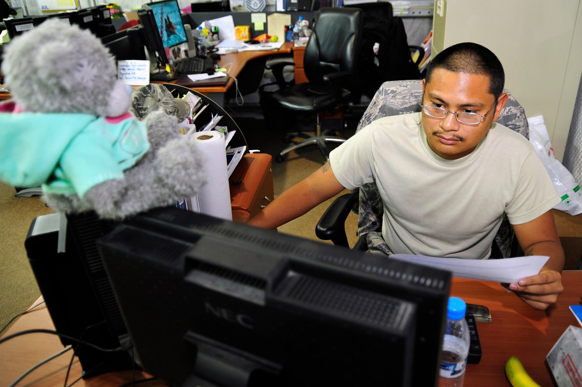 SOUTHWEST ASIA -Staff Sgt. Douglas Maramba, 380th Expeditionary Logistics Readiness Squadron, compares information in the database to current inventories Sept. 12, 2009. Sergeant Maramba is deployed from MacDill Air Force Base, Fla., and grew up in Bronx New York, N.Y. (U.S. Air Force photo/Tech. Sgt. Charles Larkin Sr)