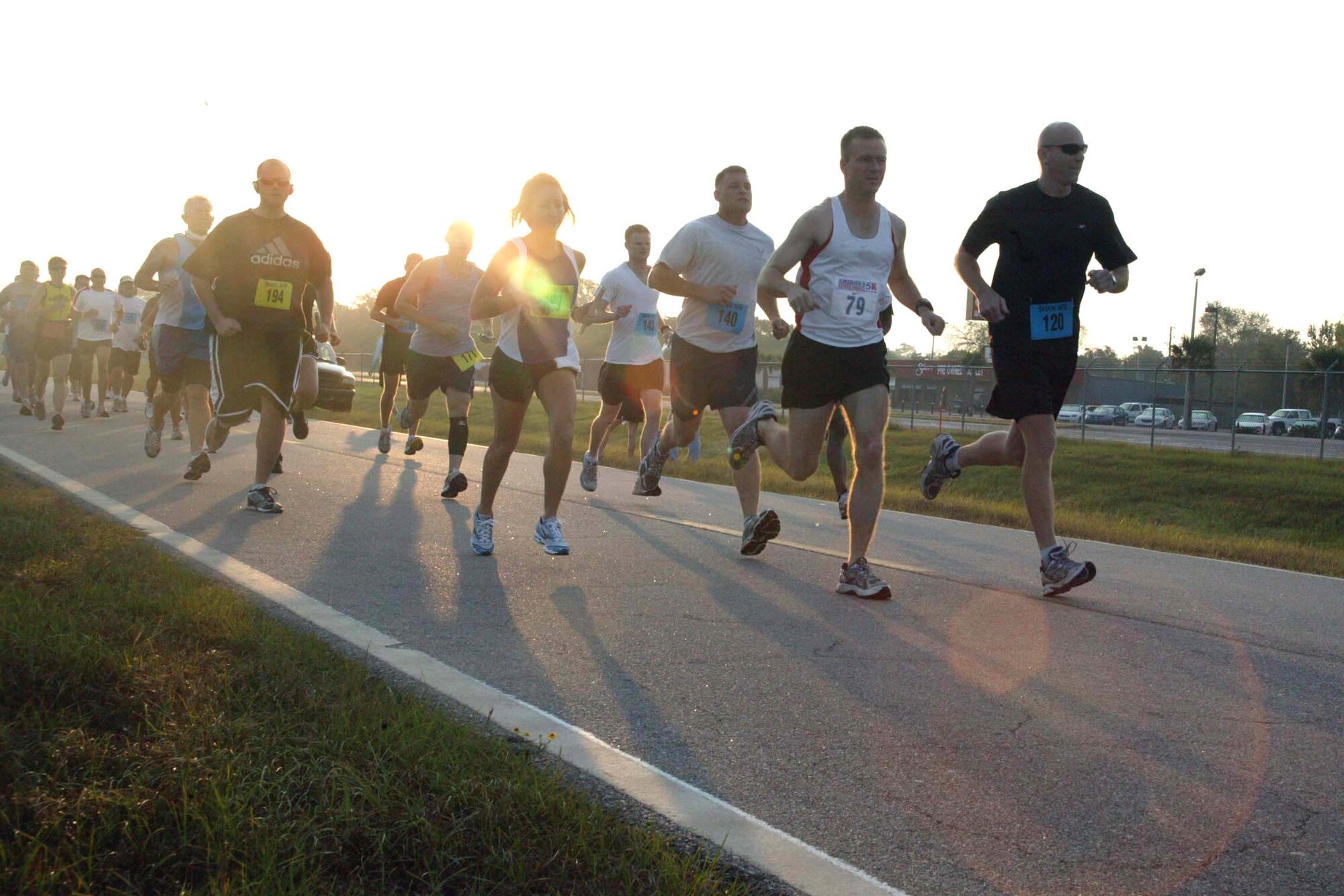 SHAW AIR FORCE BASE, S.C. -- Runners begin Shaw's 5th Annual Half-Marathon Race Sept. 12. The 13.1-mile half marathon was hosted by the fitness center to promote healthy living and 'fit-to-fight' standards. First place went to Lt. Col. Ken Ekman, 79th Fighter Squadron commander. (U.S. Air Force photo/Staff Sgt. John Gordinier)