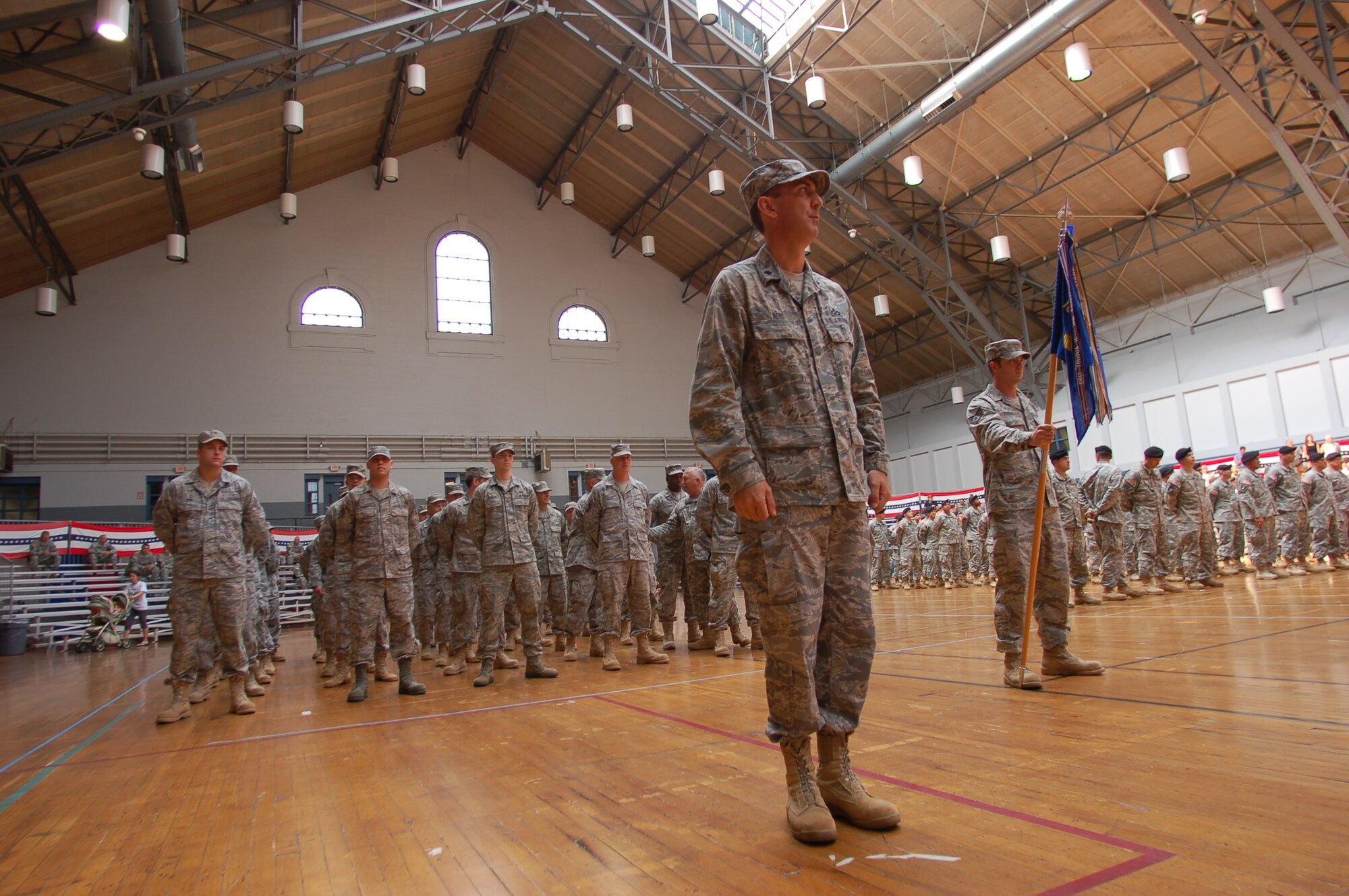 Lt. Col. William Neri, commander, 103rd Air Control Squadron, prepares to call his troops to attention at the Freedom Salute Ceremony, Aug. 16, 2009, held at the William A. O’Neil Armory in Hartford, Conn.  The 103rd ACS returned home from overseas contingency operations providing radar support for 277,000 square miles of airspace for coalition forces. (U.S. Air Force photo by Tech. Sgt. Joshua Mead)
