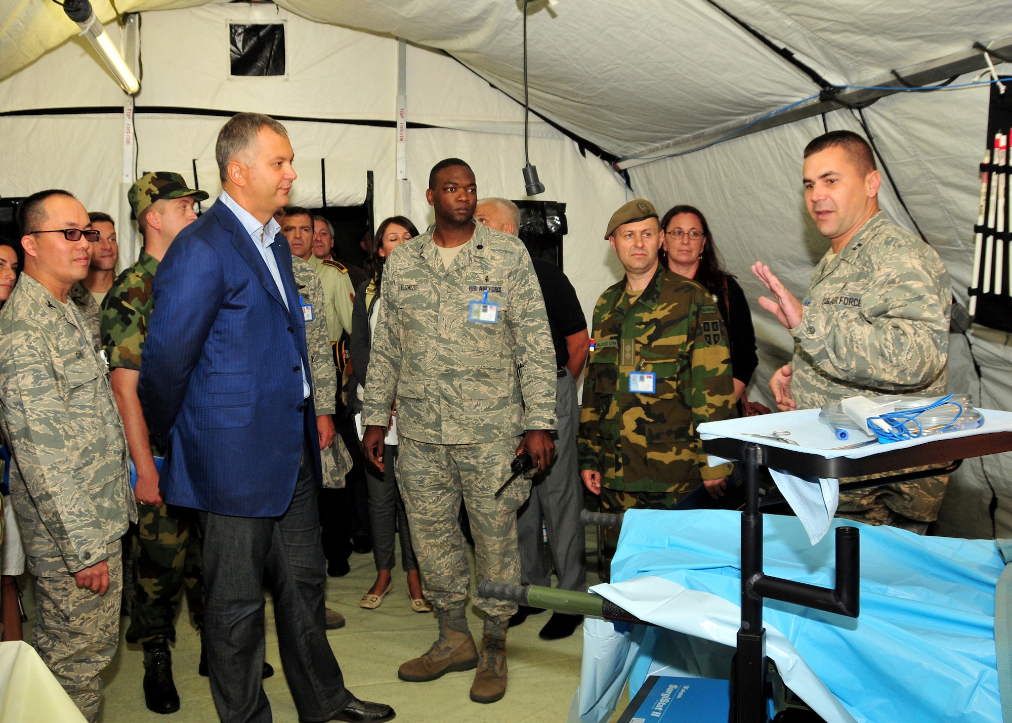 Dragan Sutanovac, Republic of Serbia minister of defense, receives a tour of the 458th Expeditionary Medical Squadron's mobile tent hospital as part of the MEDCEUR 09 distinguished visitors' day in Nis, Serbia, Sept. 10, 2009.  MEDCEUR is an annual joint and combined medical exercise with a focus on major disaster response and mass casualty situations.  More than 700 exercise participants from 15 countries are taking part in this year’s exercise, which is hosted by Serbia. (U.S. Air Force photo by Staff Sgt. Markus M. Maier)