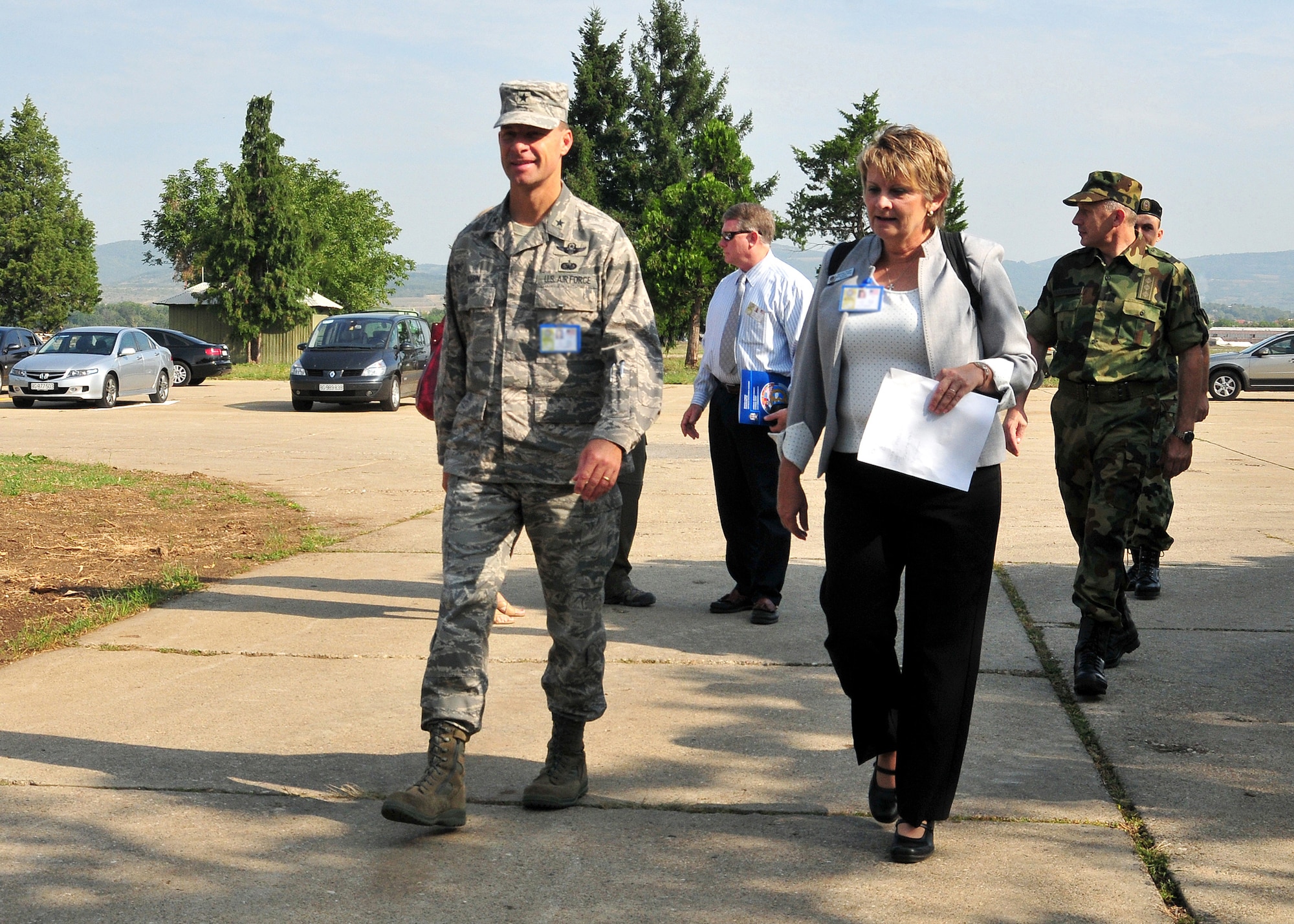 Brig. Gen. Mark Dillon, 86th Airlift Wing commander, and Maxine Fouks, 86th AW Protocol chief, walk through the exercise area as part of the MEDCEUR 09 distinguished visitors' day in Nis, Serbia, Sept. 10, 2009. MEDCEUR is an annual joint and combined medical exercise with a focus on major disaster response and mass casualty situations. More than 700 exercise participants from 15 countries are taking part in this year’s exercise, which is hosted by Serbia. (U.S. Air Force photo by Staff Sgt. Markus M. Maier)