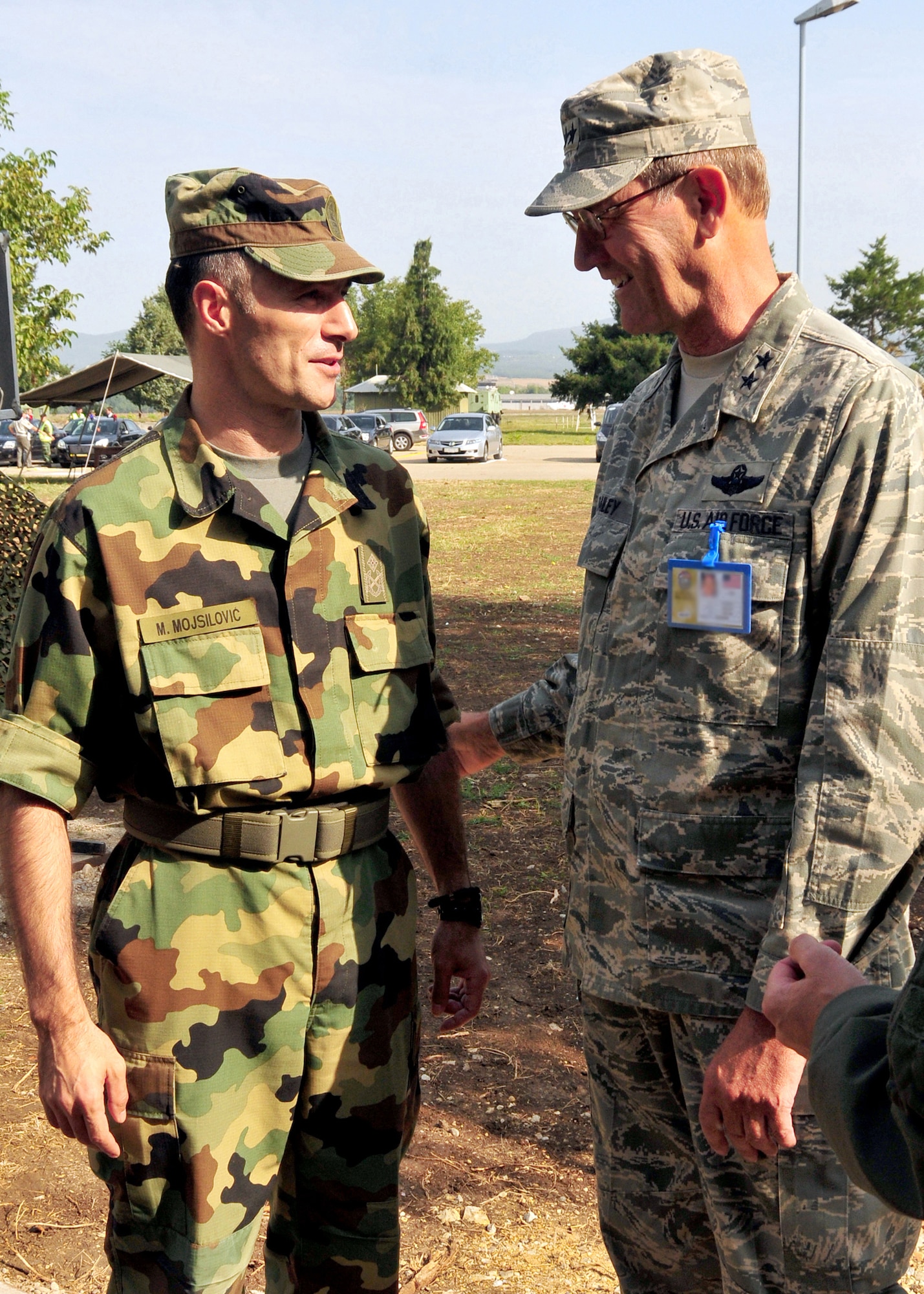 Serbian Brig. Gen. Milan Mojsilovic, leader of the MEDCEUR 2009 Host Nation Planning and Execution Team, greets Maj. Gen. Robert Bailey, Air National Guard Assistant to the Commander, U.S. Air Forces in Europe, as part of the MEDCEUR 09 distinguished visitors' day in Nis, Serbia, Sept. 10, 2009. MEDCEUR is an annual joint and combined medical exercise with a focus on major disaster response and mass casualty situations.  More than 700 exercise participants from 15 countries are taking part in this year’s exercise, which is hosted by Serbia. (U.S. Air Force photo by Staff Sgt. Markus M. Maier)