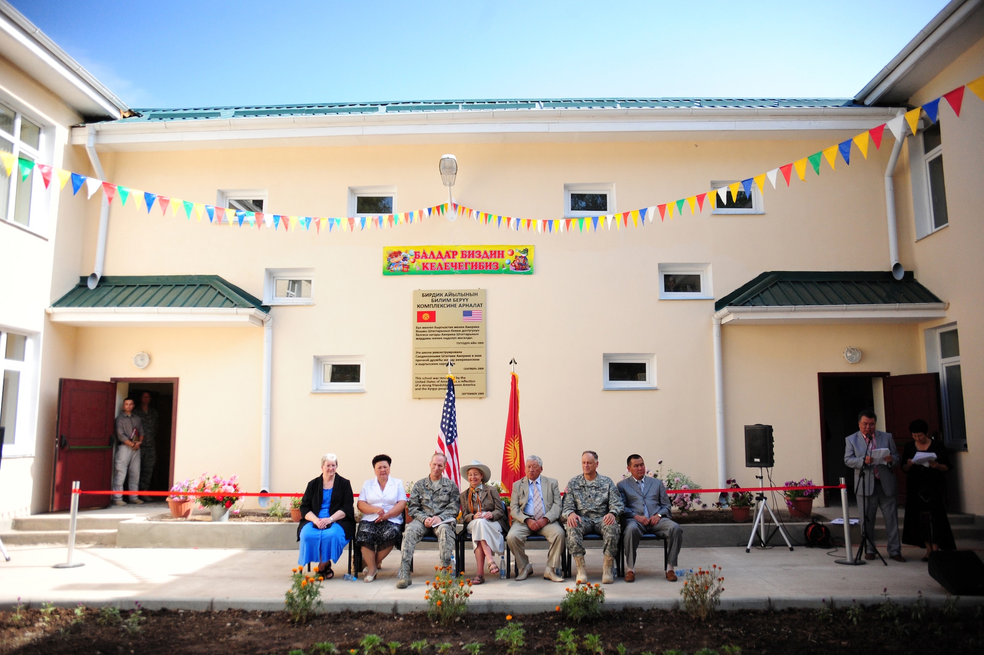 BISHKEK, Kyrgyzstan -- The Birdik Village School held it's grand reopening ceremony on the first day of school in Bishkek, Sept. 1, 2009. Students and faculty returned to a completely refurbished school in their village after months of aid from the U.S. Air Force and government agencies. (U.S. Air Force photo/Senior Airman Steele C. G. Britton)