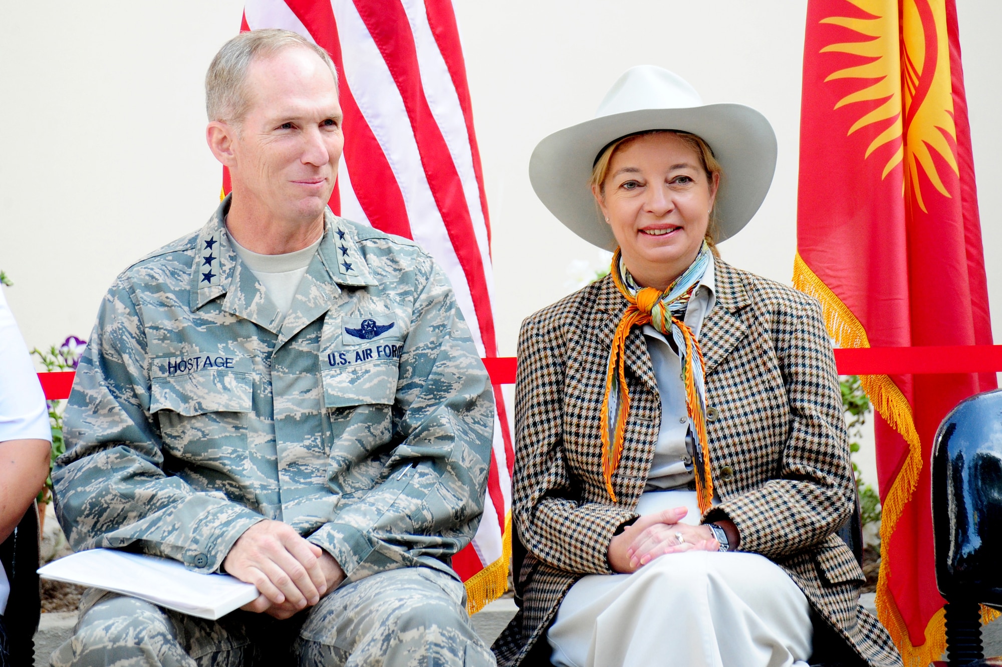 BISHKEK, Kyrgyzstan -- Lt. Gen. Mike Hostage, U.S. Air Forces Central Command commander, and The Honorable Tatiana Gfoeller, U.S. Ambassador to Kyrgyzstan, attend the grand reopening ceremony of the Birdik Village School in Bishkek, Sept. 1, 2009. Students and faculty returned to a completely refurbished school in their village after months of aid from AFCENT and government agencies. (U.S. Air Force photo/Senior Airman Steele C. G. Britton)