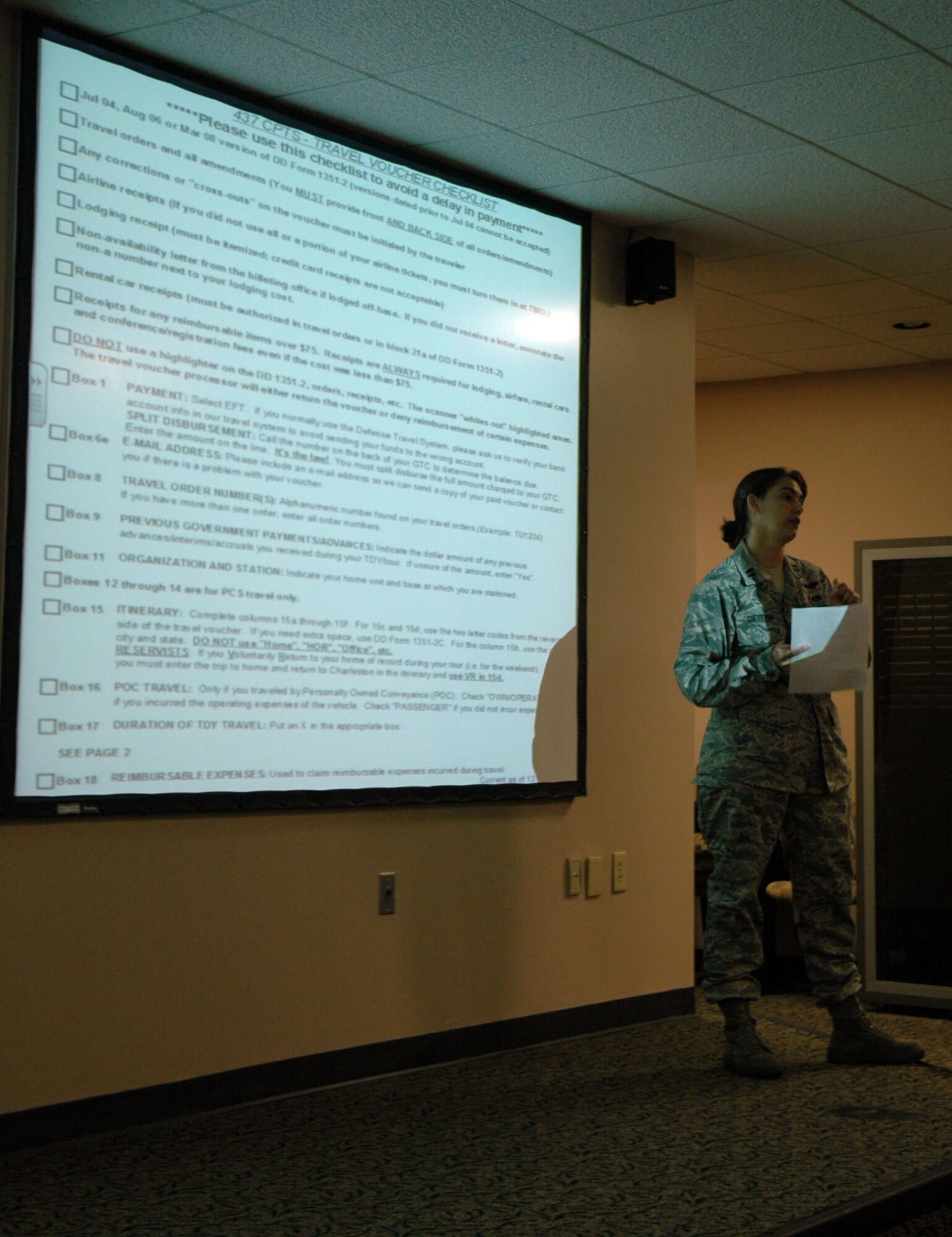 Captain Elizabeth Dietrich, 315th AW Airlift Control Flight, gives reservists important information related to submitting an accurate travel voucher.  (U.S. Air Force photo by Tech Sgt. Jeff Kelly)

