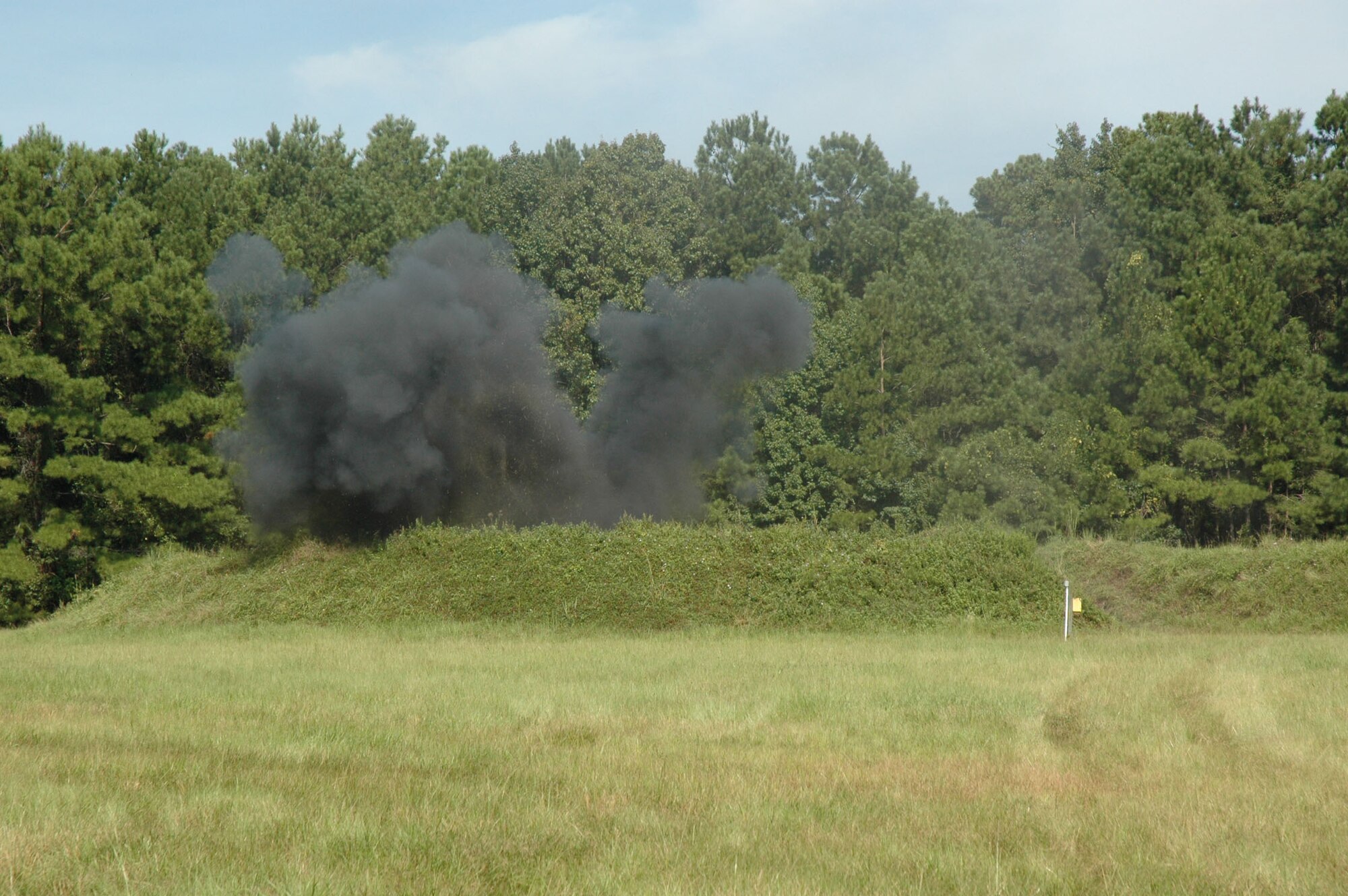 Command leadership decided to participate in the required demolitions training with members assigned to 315th Civil Engineering Flight at Charleston Air Force Base, S.C., Sept. 12 to experience a few aspects of what it means to be an EOD technician. (U.S. Air Force photo by Senior Airman Dani Pacheco)