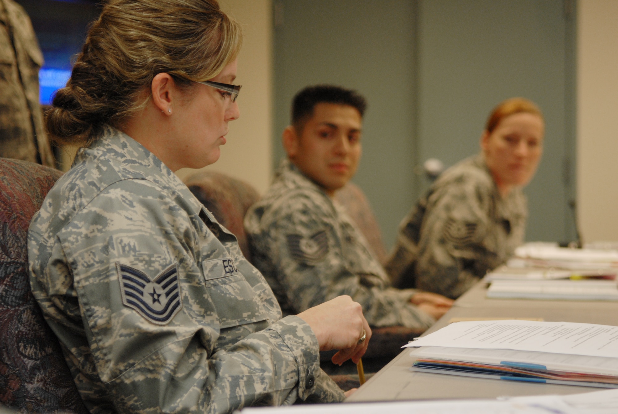 Tech. Sgt. Lisa Escobar, an installation personnel readiness technician with the Texas Air National Guard’s 149th Fighter Wing, participates in a satellite NCO Academy class discussion at Lackland Air Force Base, Texas, on Sept. 10, 2009. (U.S. Air Force photo by Staff Sgt. Eric L. Wilson)(RELEASED).