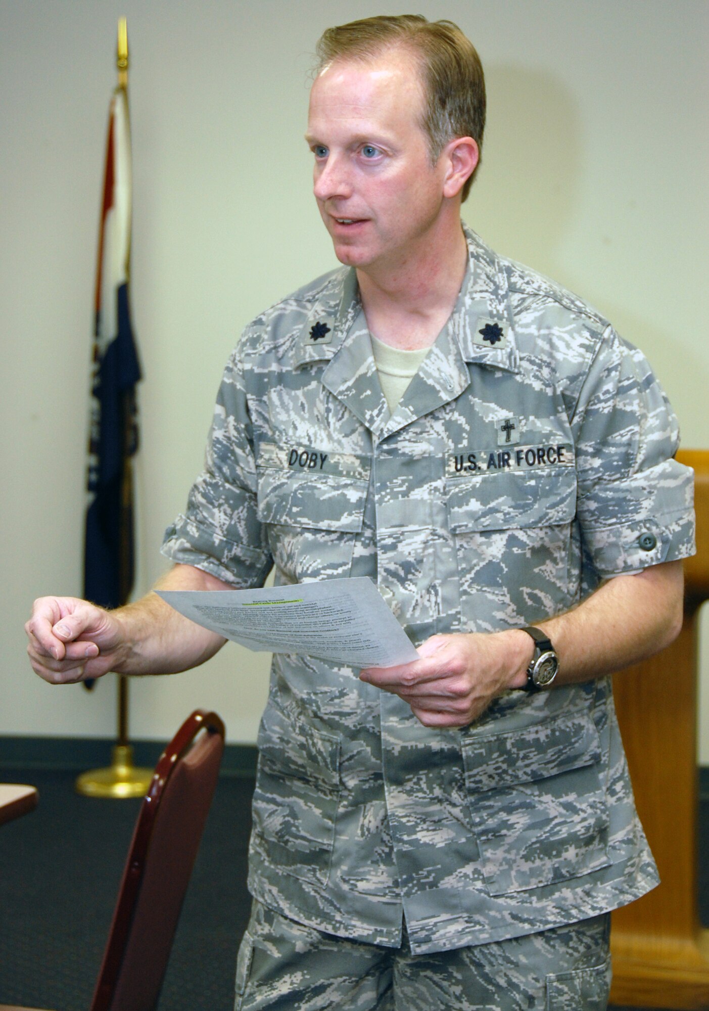 Lt. Col. Scott Doby, 131st Bomb Wing chaplain, speaks to the audience at the Brown Bag Speaker Series luncheon Sept. 12. Chaplain Doby spoke about beating 'burnout' and overcoming gridlock. (Photo by Staff Sgt. Amber Hodges)