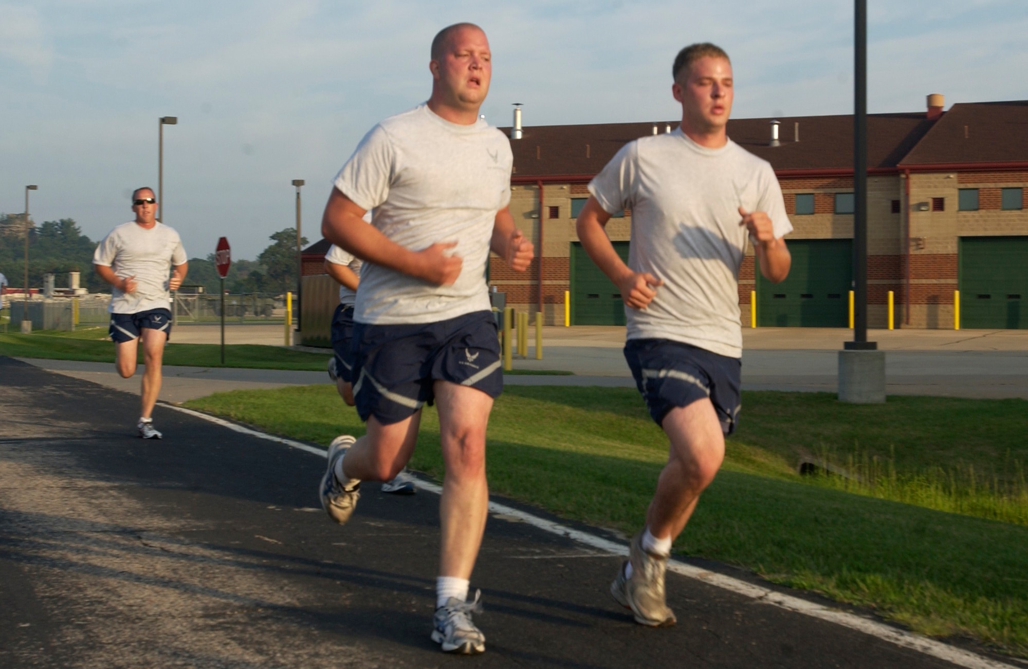 Senior Airman Brian Householder (right) and Senior Airman Dan Gish  of the 133rd Test Squadron  (TS) based in Fort Dodge, Iowa complete the 1.5 mile run as part of the annual Physical Fitness test.  Airmen from the 133rd TS, Iowa Air National Guard, are at the Volk field combat readiness training center, Wisconsin as part of their two week annual training.

USAF Photo by MSgt Mike Battien
Iowa  JFHQ Public Affairs  


