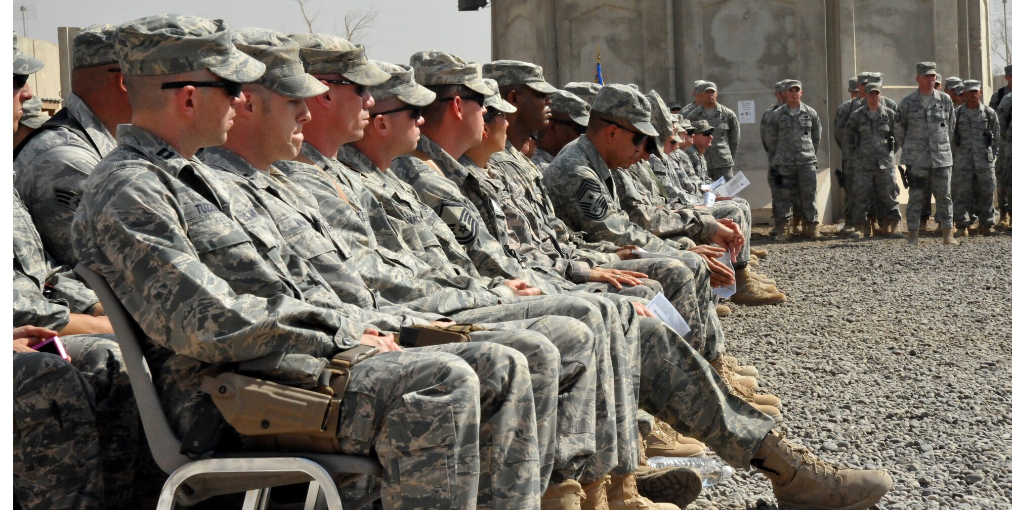 CAMP STRYKER, Iraq -- The 732d Expeditionary Security Forces Squadron, Detachment 2 members came out Sept. 12 to honor a fallen Defender, 1st Lt. Joseph D. Helton Jr., who perished when a roadside bomb detonated close to his vehicle near Baghdad Sept. 8.  The Monroe, Ga., native is the first security forces officer to have died in the wars in Iraq and Afghanistan.  (U.S. Air Force photo/Staff Sgt. Misty D. Slater)
