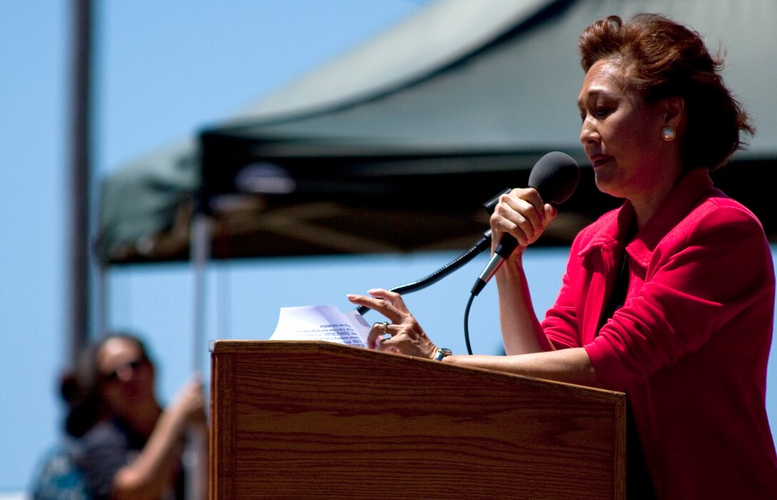 Coralie Chun Matayoshi, representative speaker, Hawaii Chapter of the American Red Cross addresses attendees of the 2009 Combined Federal Campaign Kick-off event, Sept. 14 at Bordelon Field. The CFC kickoff hoasted a variety of charities and non-profit organizations Federal employees have the opportunity of supporting through the CFC. (Official U.S. Marine Corps photo by Cpl. Achilles Tsantarliotis)(Released)