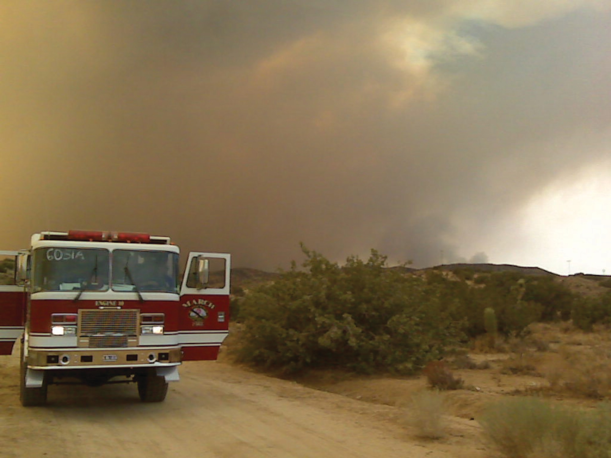 strike team 6051A deploys: The firehouse on March ARB received a request for assistance Saturday, August 29, to help with the U.S. Forest Service’s massive ‘Station Fire’ blaze north of Los Angeles. The call activated strike team 6051A, a team of local fire engines: one from Indio, one from Murrieta, two from Riverside, and March ARB’s Engine 10. The four firefighters from March deployed to an area of the fire just north of Glendale with the mission of structural protection. The firefighters will remain on the fire until dismissed by commanders on the scene. The strike team is part of a mutual aid agreement between area cities, counties, and CalFire where they may call one another when they need help. The deployed firefighters are: Frank Hanson, Jeff Cochran, Jon Sandvig, and Dan Caballero. (U.S. Air Force photo)