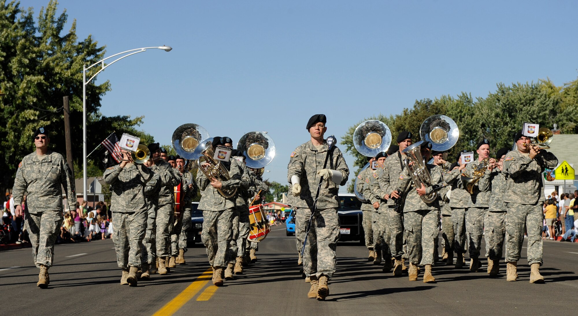MOUNTAIN HOME AIR FORCE BASE, Idaho -- The 25th Army Band from Gowen Field in Boise, Idaho, leads the 49th annual Air Force Appreciation Day parade procession of more than 120 parade entries Sept. 12 in downtown Mountain Home. The year’s festivities began with a corn shucking competition and fun run Sept. 11 and ended with the parade and free barbecue Sept. 12. AFAD began in 1962 as a way for the Mountain Home Chamber of Commerce to express their gratitude for the economic benefits the Air Force brought to the area and a way to encourage neighborly growth. (U.S. Air Force photo by Airman 1st Class Renishia Richardson)