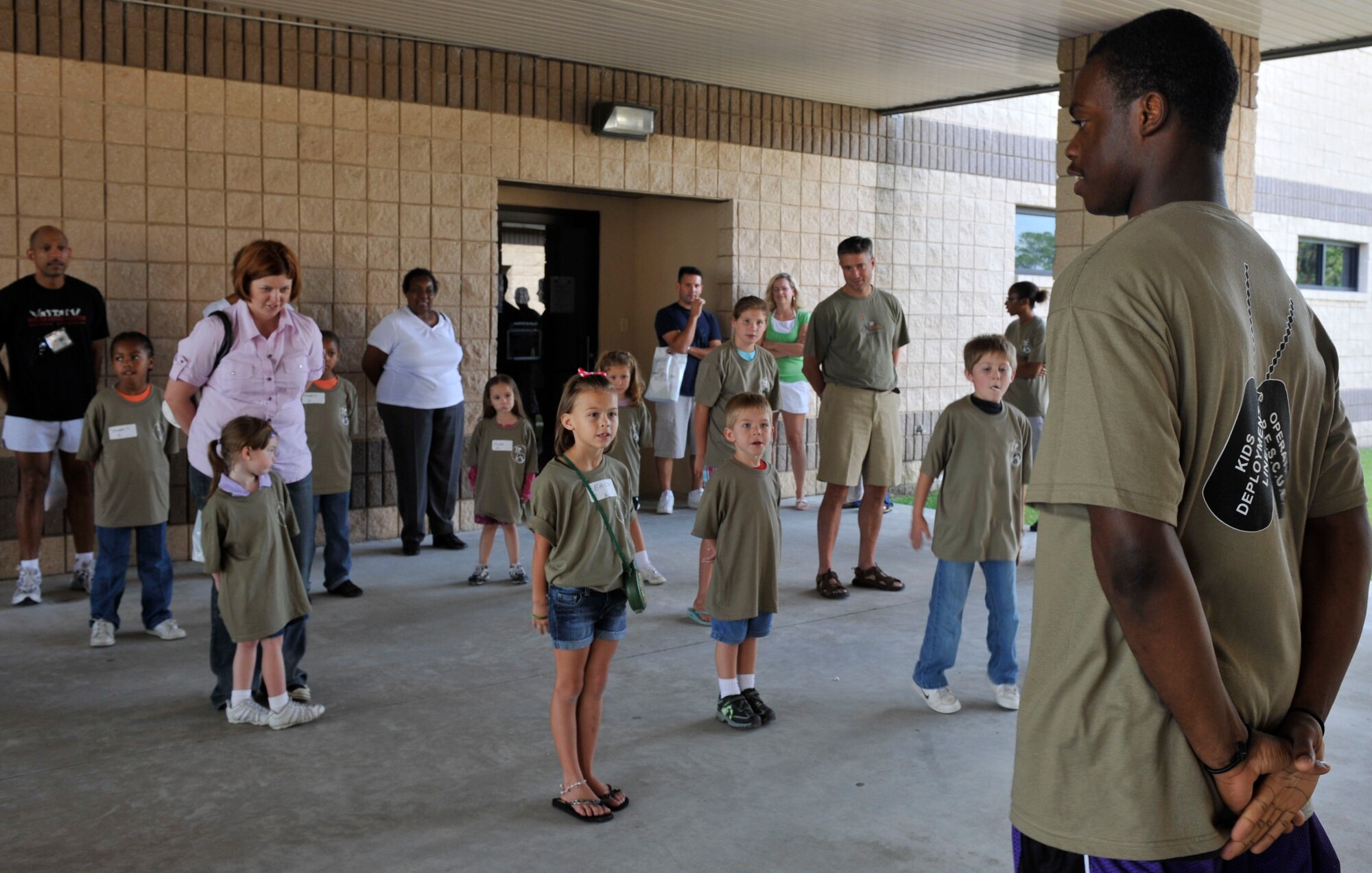 MOODY AIR FORCE BASE, Ga. -- Family members participate in the kids’ deployment line here Sept. 12. The children were able to experience the process of going through a deployment line, receive briefings, giveaways and a static display. This event allowed children the opportunity to experience first hand what their parent goes through prior to leaving for a deployment. (U.S. Air Force photo by Senior Airman Schelli Jones)