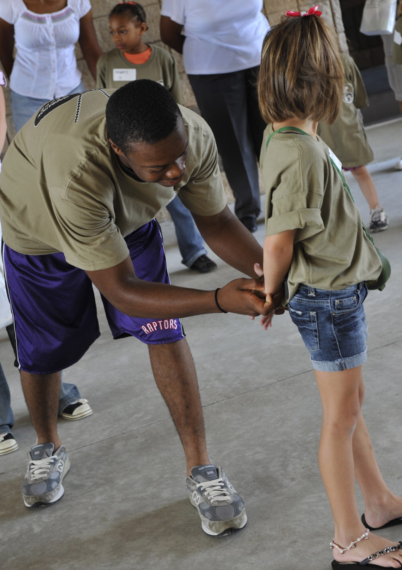 MOODY AIR FORCE BASE, Ga. -- Family members participate in the kids’ deployment line here Sept. 12. The children were able to experience the process of going through a deployment line, receive briefings, giveaways and a static display. (U.S. Air Force photo by Senior Airman Schelli Jones)