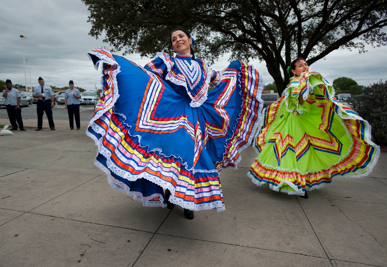 Laura Sanchez and Eva Saliz, Mexican Folklorico dancers with Grupo Amistad sponsored by the University of the Incarnate Word, perform Sept. 14 during the Randolph Hispanic Heritage Month kickoff, an event filled with music, folkloric dancing, a salsa competition and a sampling of Hispanic cuisine. (U.S. Air Force photo/Steve Thurow) 