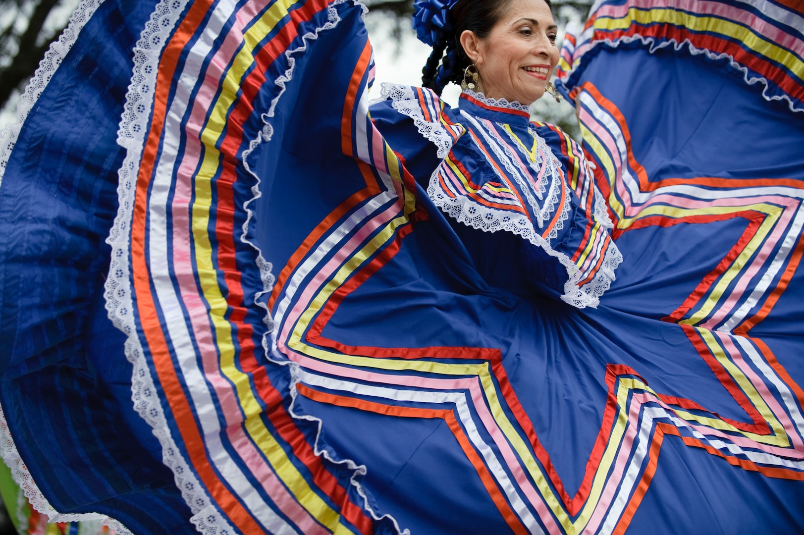 Laura Sanchez, a Mexican Folklorico dancer with Grupo Amistad sponsored by the University of the Incarnate Word, performs at the Randolph Hispanic Heritage Council kick off of Hispanic Heritage Month Sept. 14 during an event filled with music, folkloric dancing, a salsa competition and local cuisine. (U.S. Air Force photo/Steve Thurow) 