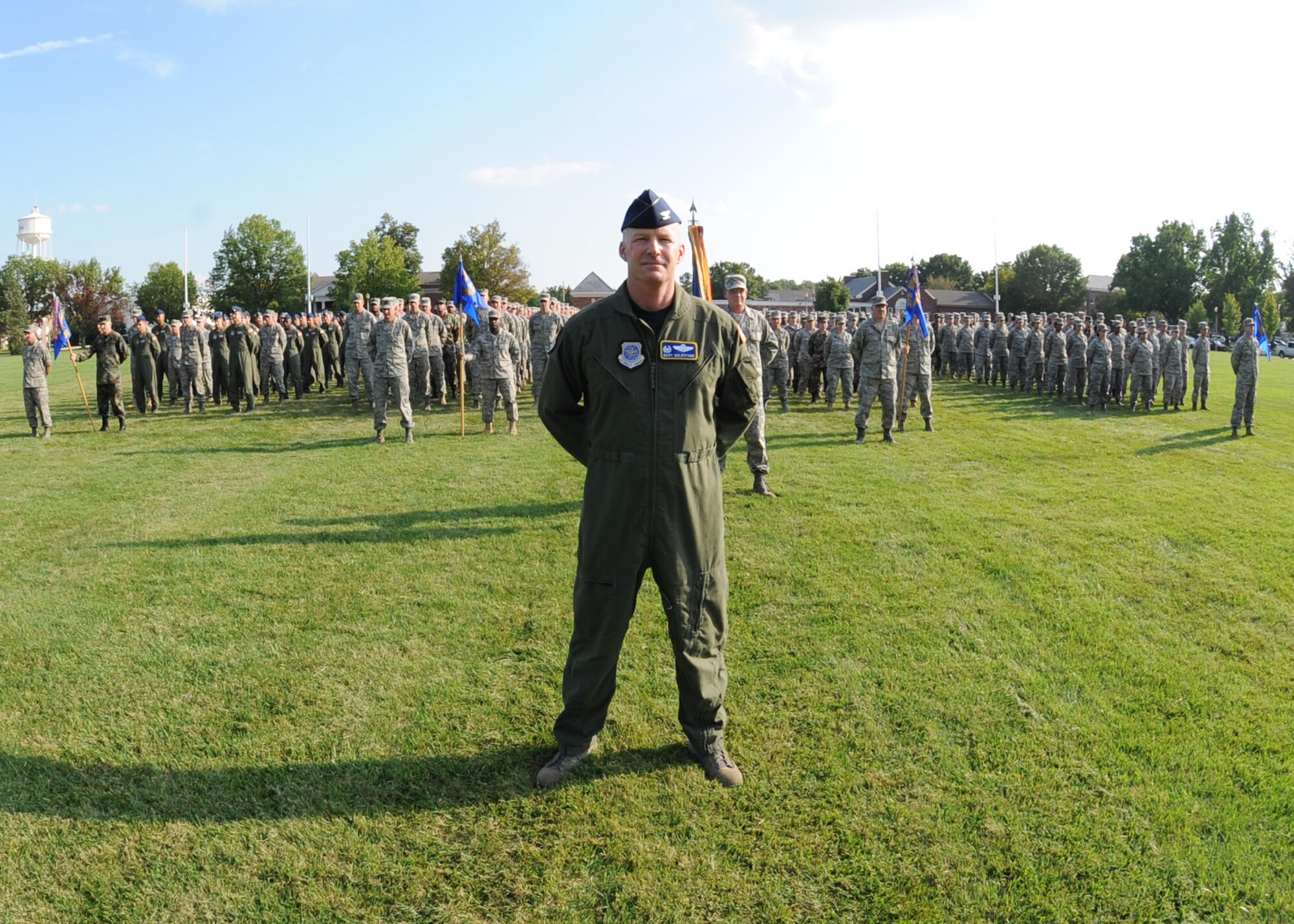 Scott Air Force Base, Ill – Col. Gary Goldstone, 375th Airlift Wing commander, stands at parade rest in front of his troops on the parade field of Scott, Friday during the Sept. 11 retreat. Members of Team Scott gathered to pay tribute to those that lost their lives on 9/11. (U.S. Air Force photo by Airman 1st Class Wesley Farnsworth)