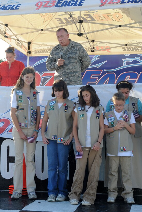 LANGLEY AIR FORCE BASE, Va. --  Chaplain (Col.) Scott Henry, 1st Fighter Wing Chapel, gives an invocation to kick off Freedom Walk at Langley Motor Speedway Sept. 11. Freedom Walk was held in remembrance of those lost during  9/11 terrorist attacks and to honor our military members and first responders.(U.S. Air Force photo/Senior Airman Zachary Wolf)