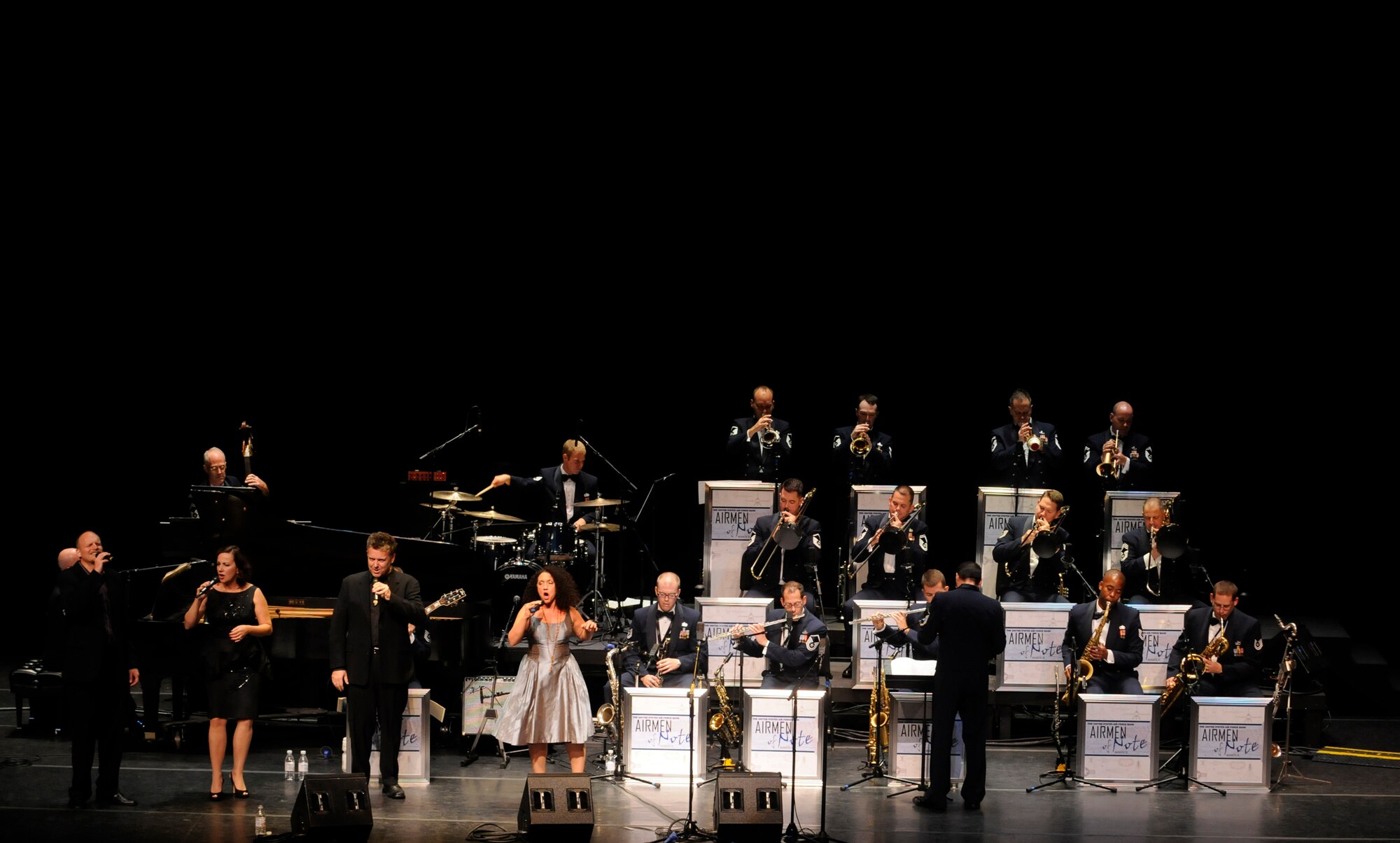 Grammy Award winning vocal ensemble, the New York Voices perform with The United Sates Air Force Band’s Airmen of Note during a concert Sept. 11 in the Linser Auditorium at George Washington University, D.C. The two groups performed together as part of the USAF Band’s jazz heritage concert Series. For a list of all the free, jazz heritage series concerts visit www.bollng.af.mil. (U.S. Air Force photo by Staff Sgt. Tim Chacon)
