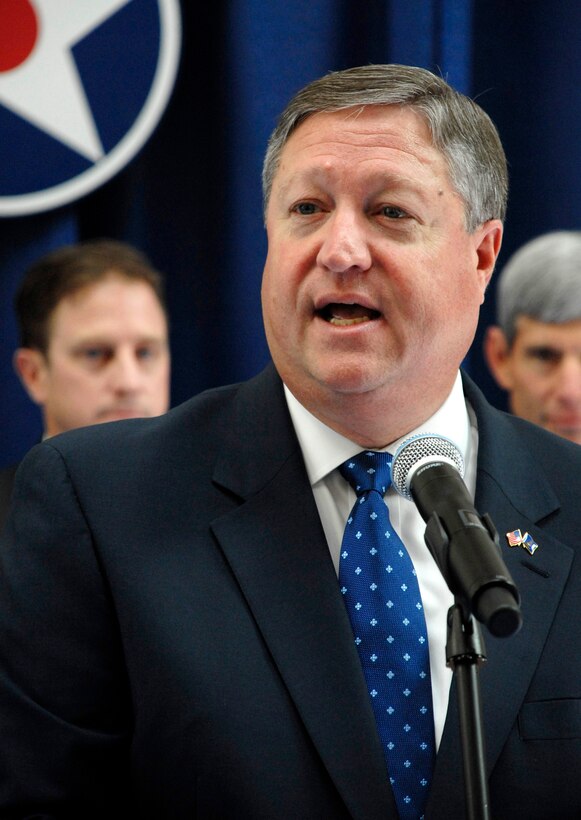 Secretary of the Air Force Michael Donley welcomes conference attendees during a ribbon-cutting ceremony at the 2009 Air Force Association Air & Space Conference and Technology Exposition Sept. 14, in Washington, D.C. (U.S. Air Force Photo/Master Sgt. Stan Parker)