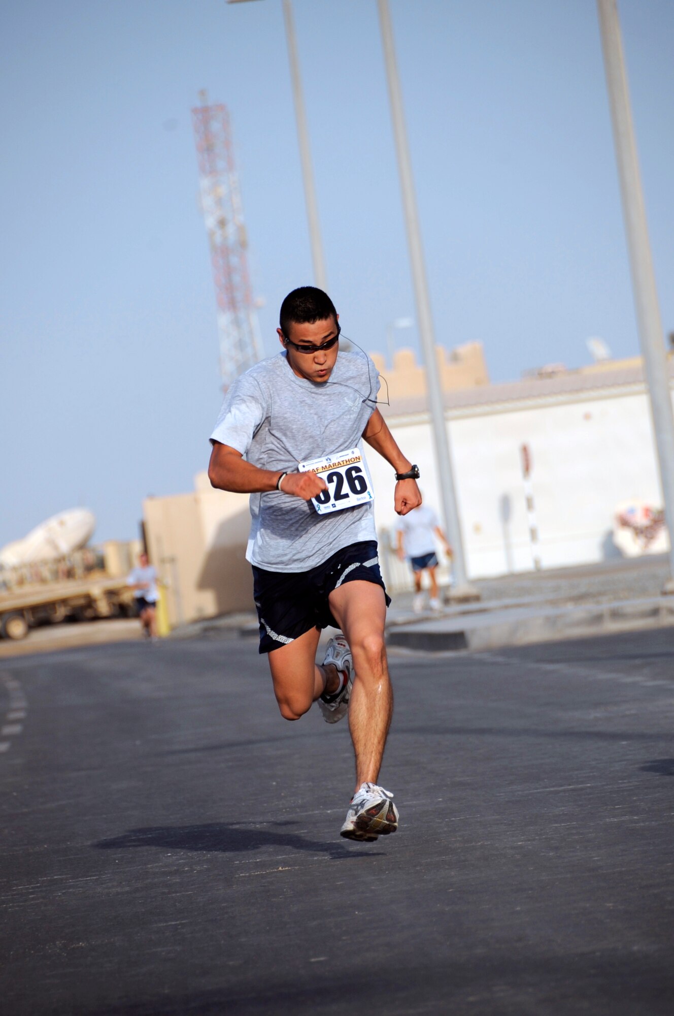 SOUTHWEST ASIA – Staff Sgt. Derrick Johnson, 380th Expeditionary Logistics Readiness Squadron, sprints for the finish line at the 13th Annual Air Force Marathon here Sept. 13. Sergeant Johnson finished the half marathon in 1:41:15. He is deployed from Royal Air Force Mildenhall, United Kingdom, and grew up in Arlington, Texas. (U.S. Air Force photo/Senior Airman Stephen Linch)