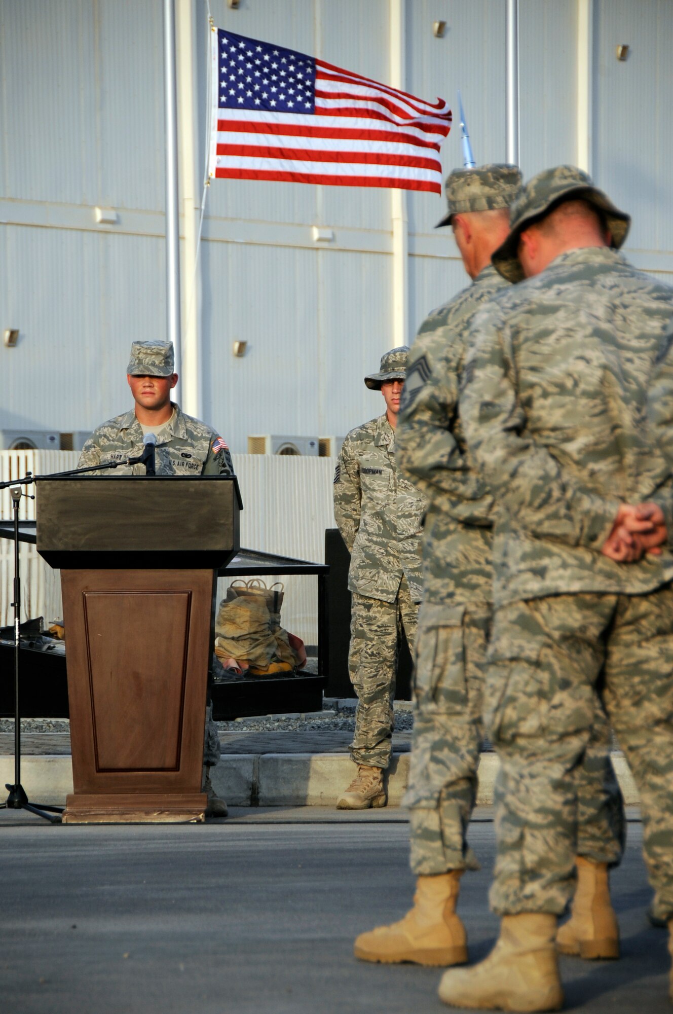 SOUTHWEST ASIA – Airman 1st Class Joseph Hart, 380th Expeditionary Security Forces Squadron, recites the Policemen’s Prayer during a commemoration ceremony here on the eighth anniversary of Sept. 11. The 380th AEW is home to KC-10s, U-2s, Global Hawks and E-3 Sentry's, and provides aerial refueling, intelligence, surveillance, reconnaissance and air battle management to OPERATIONS ENDURING AND IRAQI FREEDOM. (U.S. Air Force photo/Senior Airman Stephen Linch)