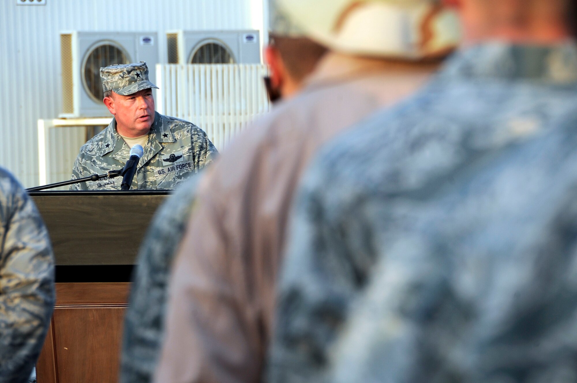 SOUTHWEST ASIA – Brig. Gen. Bryan Benson, 380th Air Expeditionary Wing commander, gives a speech as members stand in formation during a commemoration ceremony here on the eighth anniversary of Sept. 11, 2001. The 380th AEW is home to KC-10s, U-2s, Global Hawks and E-3 Sentry's, and provides aerial refueling, intelligence, surveillance, reconnaissance and air battle management to OPERATIONS ENDURING AND IRAQI FREEDOM. (U.S. Air Force photo/Senior Airman Stephen Linch)