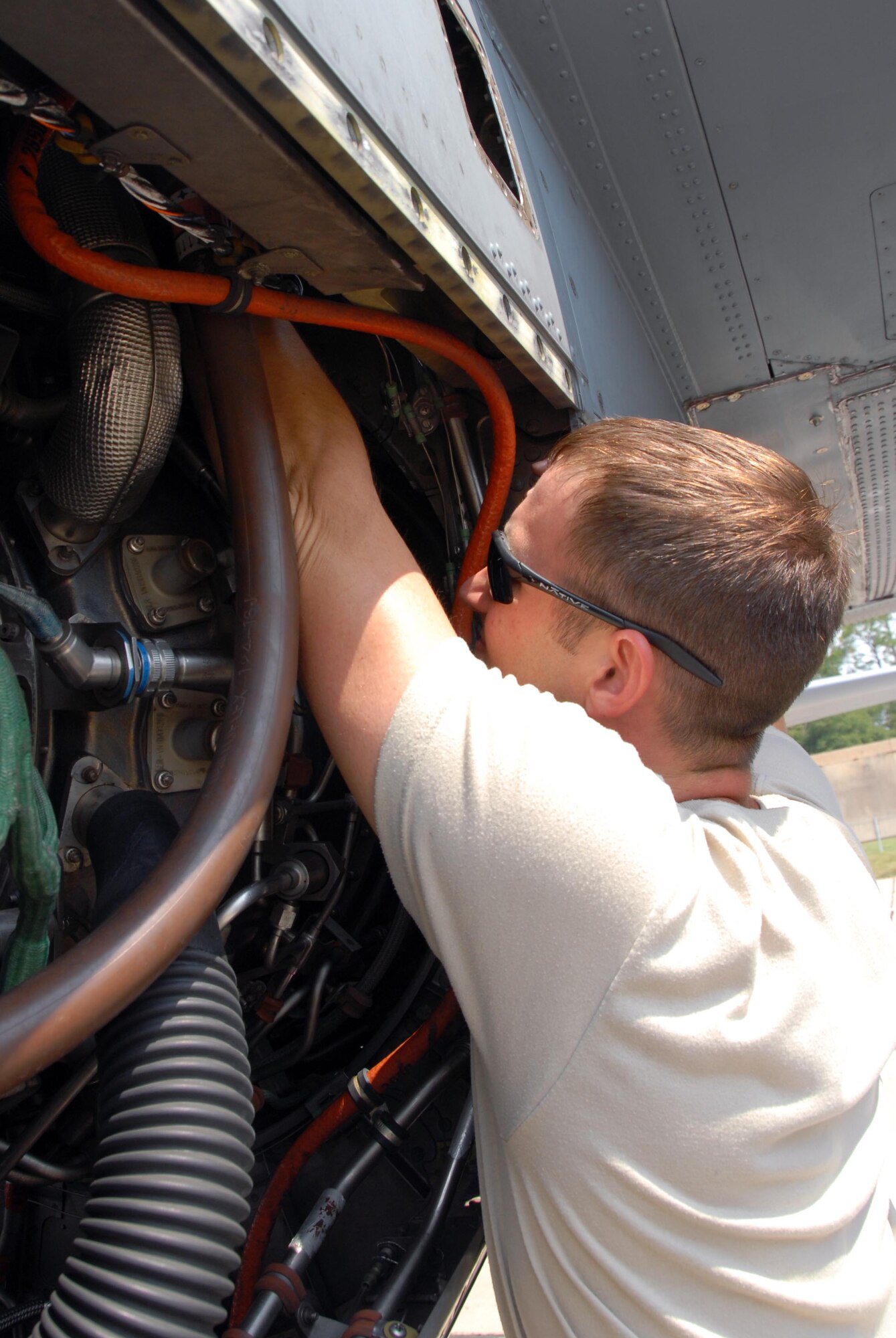 The flying squadrons of the 403rd are constantly in the air completing a number of missions, but when they are on the ground, the aircrafts go through intensive care. Senior Airman Jason Rimmer,403rd Maintenance Group, inspects the engine of a C-130J Hurricane Hunter. The maintenance Airmen make sure that everything is safe and ready before sending them back into the air. (Air Force Photo by Senior Airman Tabitha Dupas)