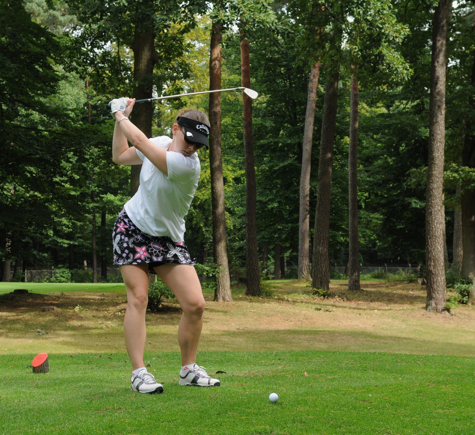 RAMSTEIN AIR BASE, Germany -- Captain Christine Stevens drives during the 17th Air Force Top 3 Golf Tournament Sept. 9 at Woodlawn Golf Course here. Captain Stevens' team, which also included Maj. Randy Naylor, Master Sgt. Shaun Ford, and Tech Sgt. Jamain Braxton, took second place in the best-ball format with a score of 70. They were bested by the team of Maj. Thomas Kramer, Captain Frank Copous and Master Sgt. Joe Pineda, who collectively shot a 68 on the day. 
Sergeant Pineda also took the longest drive award, with Sergeant Ford getting closest to the pin. 
Top 3 officials plan to make the tournament an annual event.  (USAF photo by Master Sgt. Jim Fisher) 